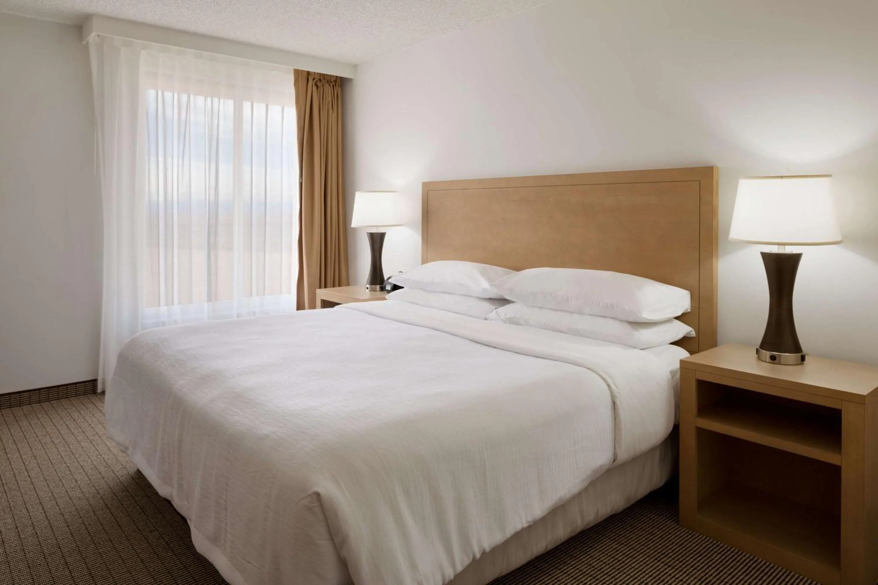 Bed in Embassy Suites by Hilton Denver International Airport