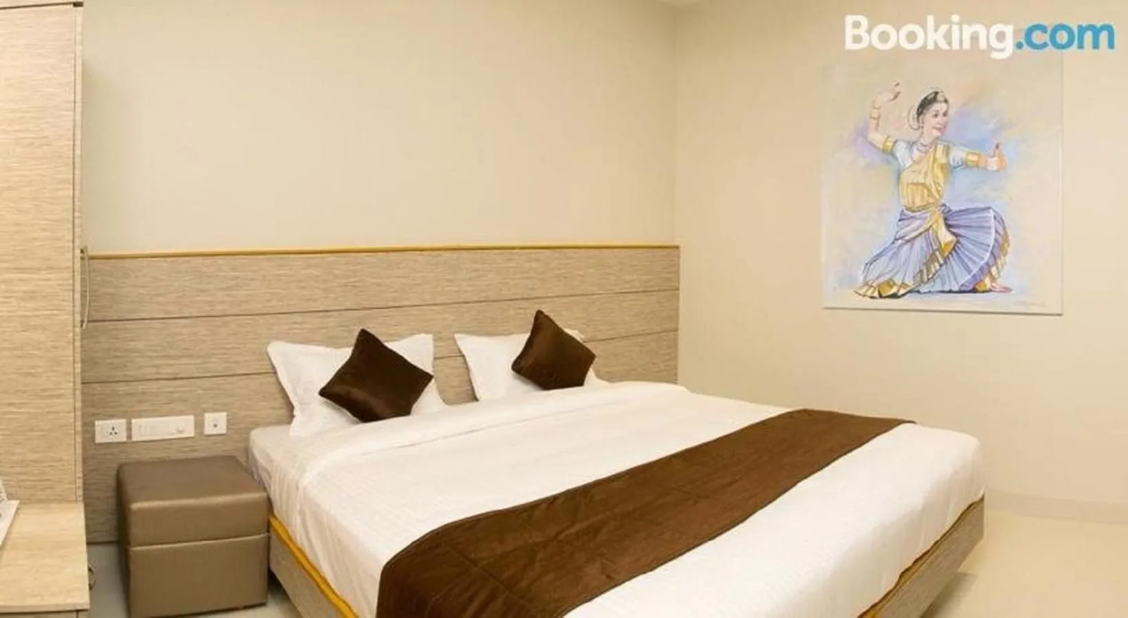 Bed in Sri Aadhish Grand Hotel