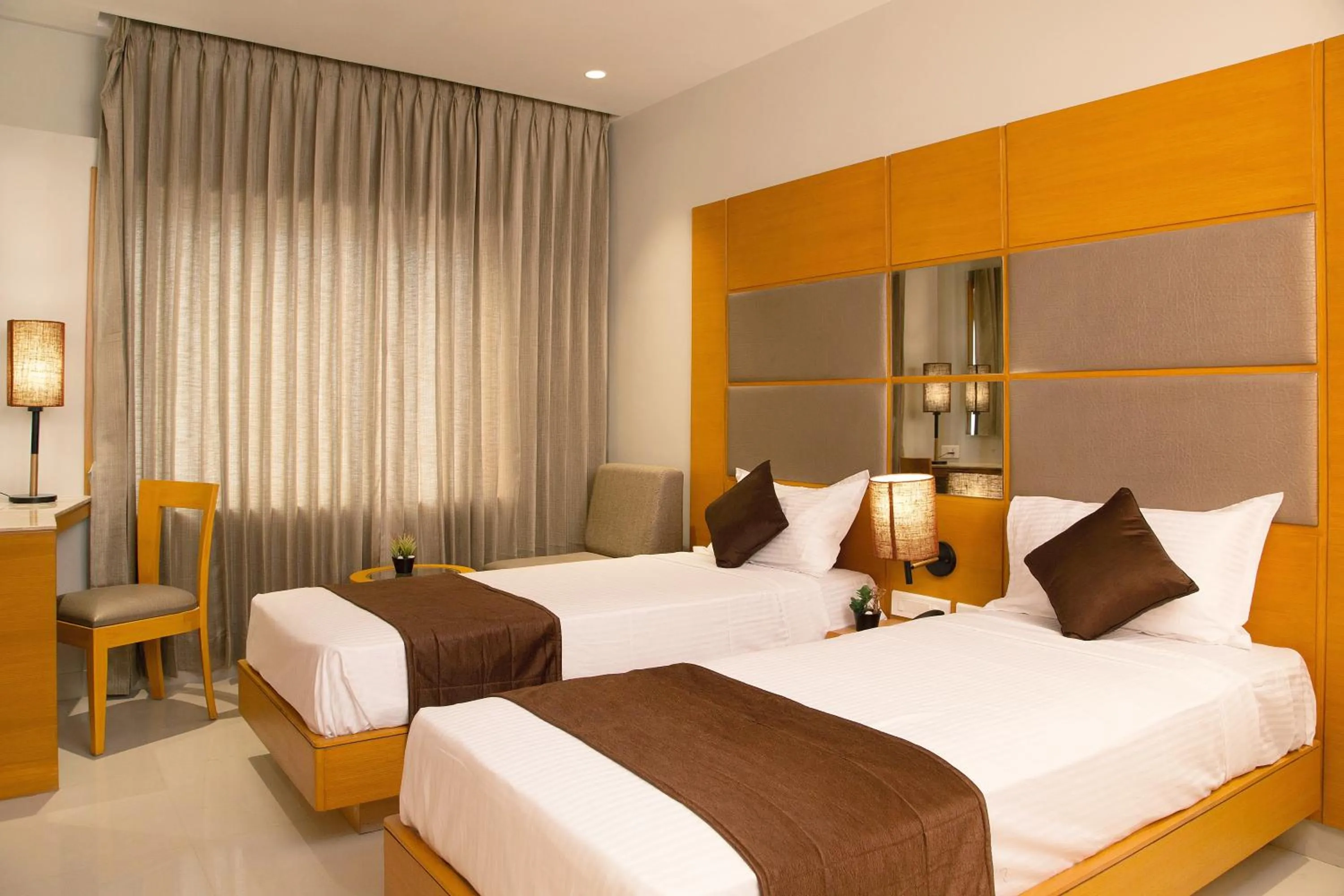 Bedroom, Bed in Sri Aadhish Grand Hotel