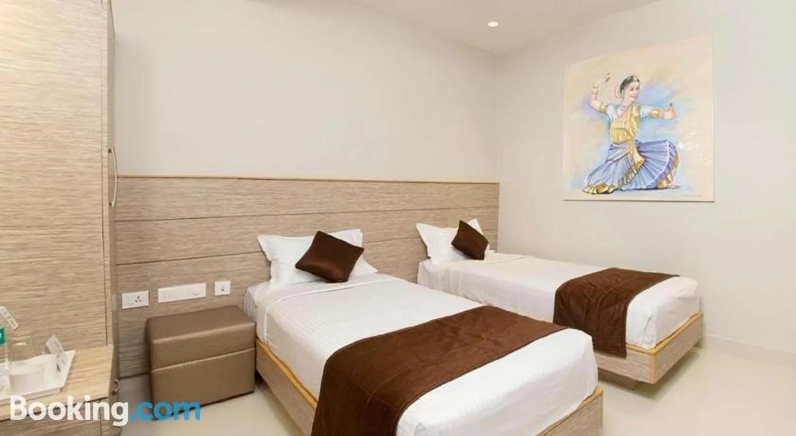 Bed in Sri Aadhish Grand Hotel