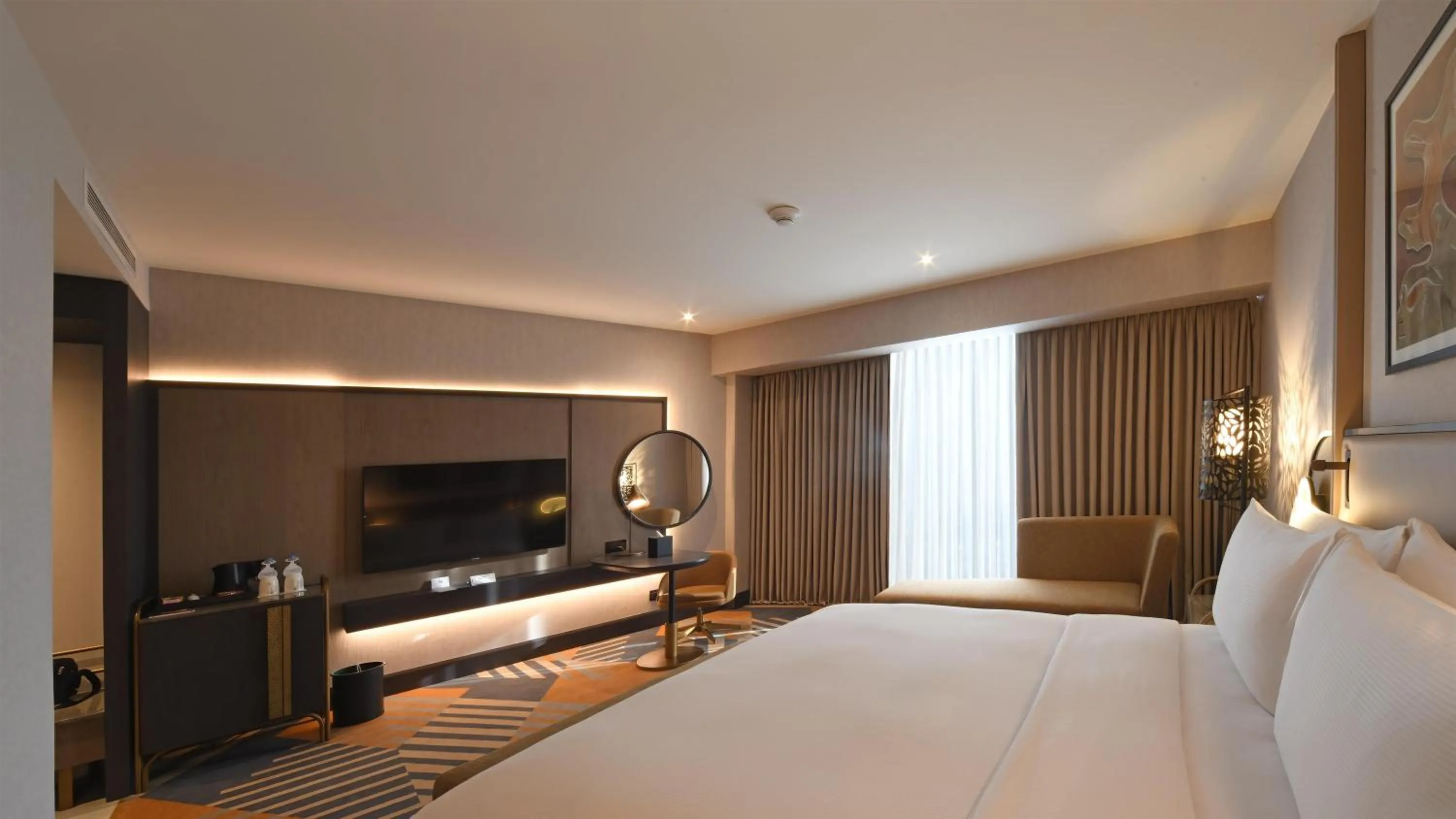 Living room, Bed in Hilton Amman