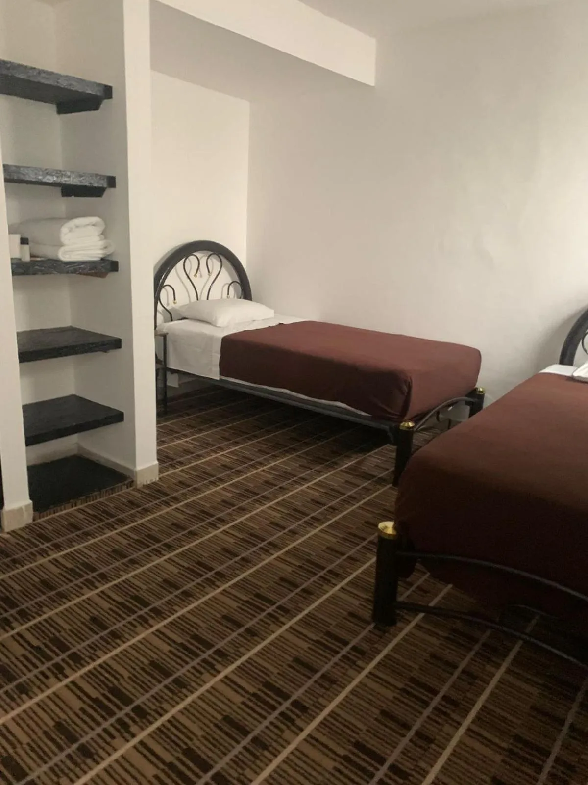 Bed in Kuku Ruku Hotel