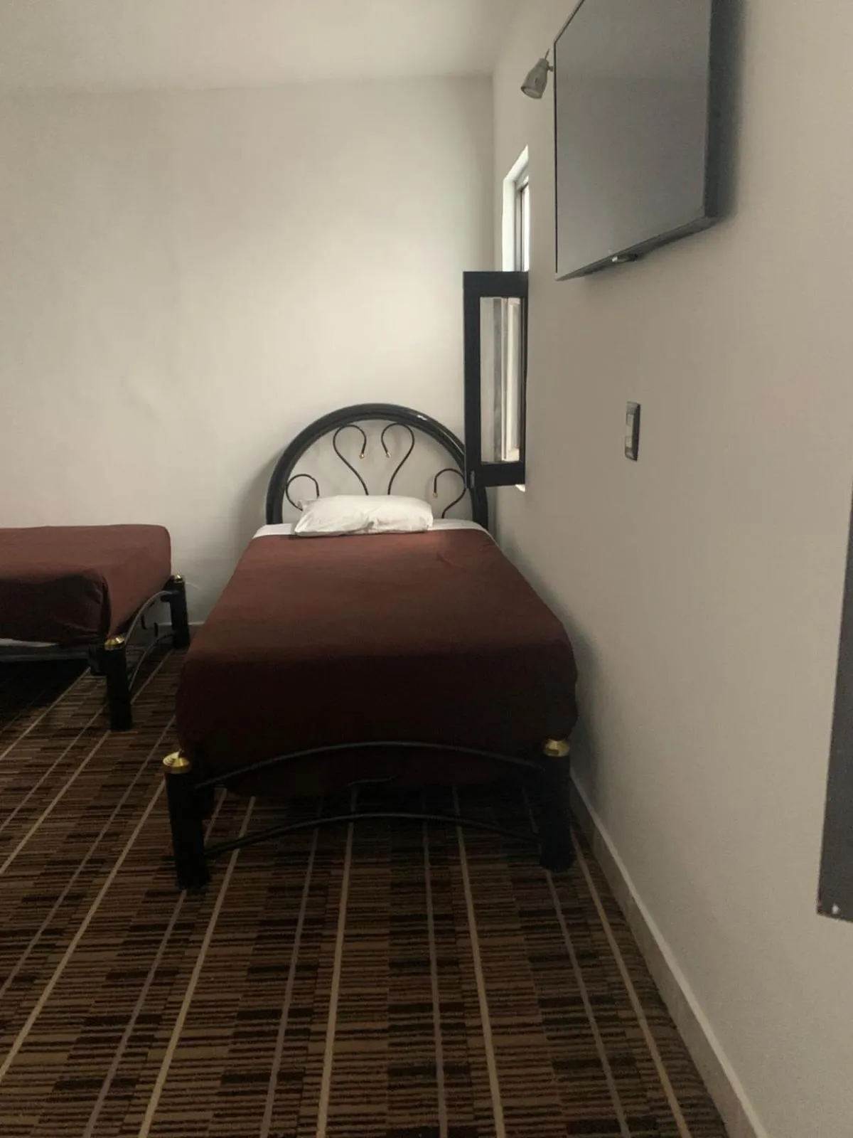 Bed in Kuku Ruku Hotel