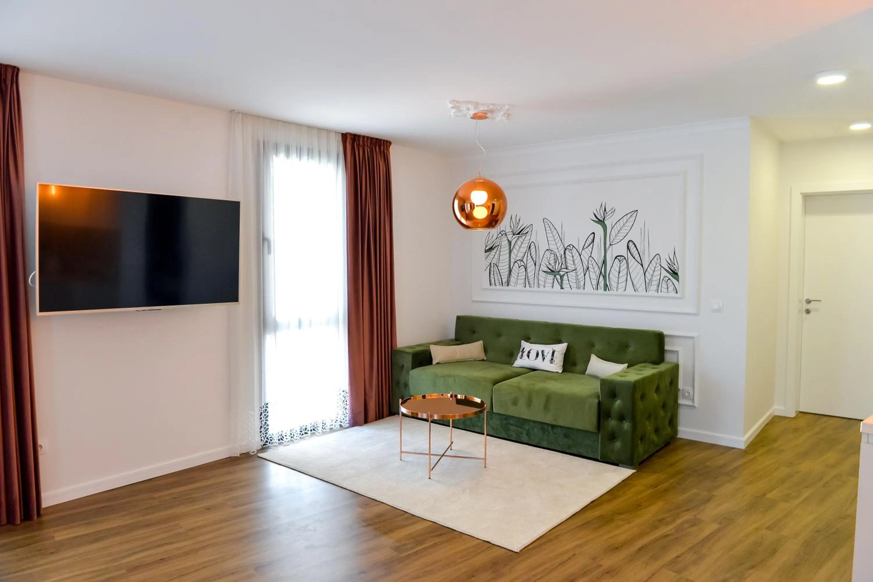 Communal lounge/ TV room in Boutique Apartments Blagoevgrad