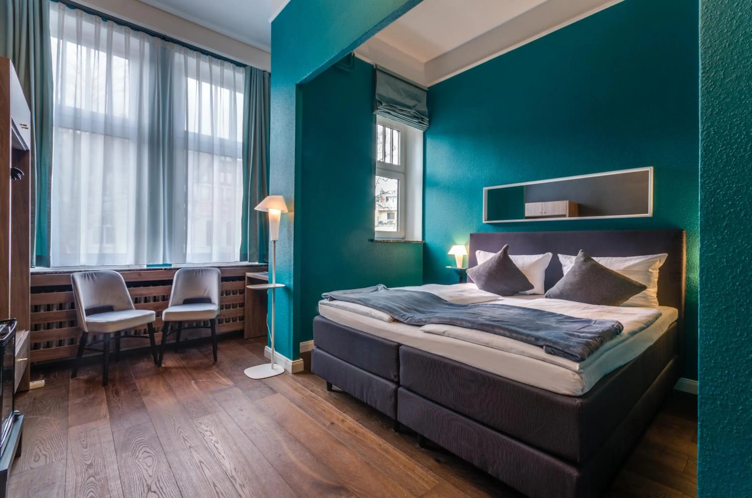 Bed in Monopol Boutique Hotel