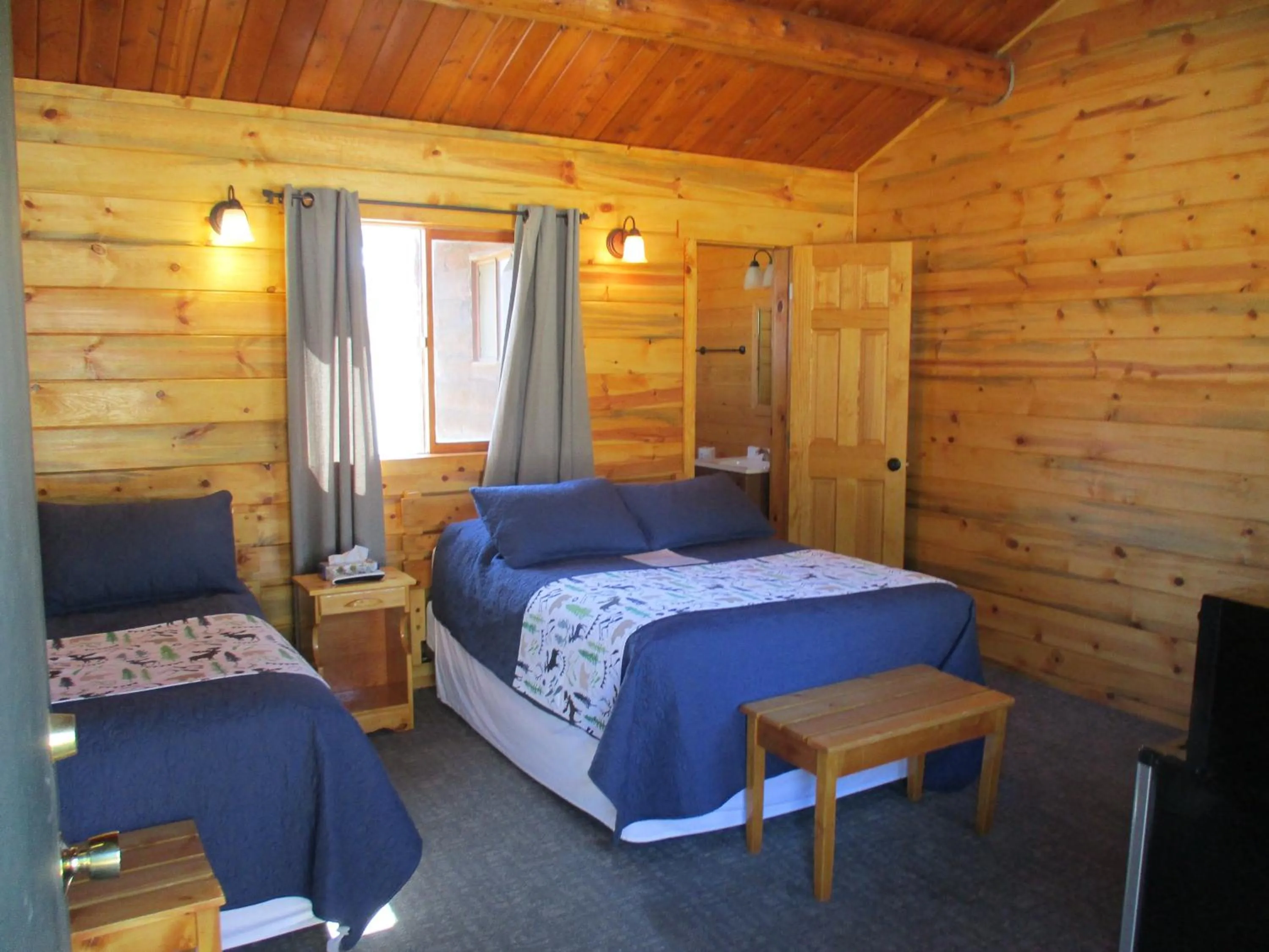 Bed in Yellowstone Valley Inn