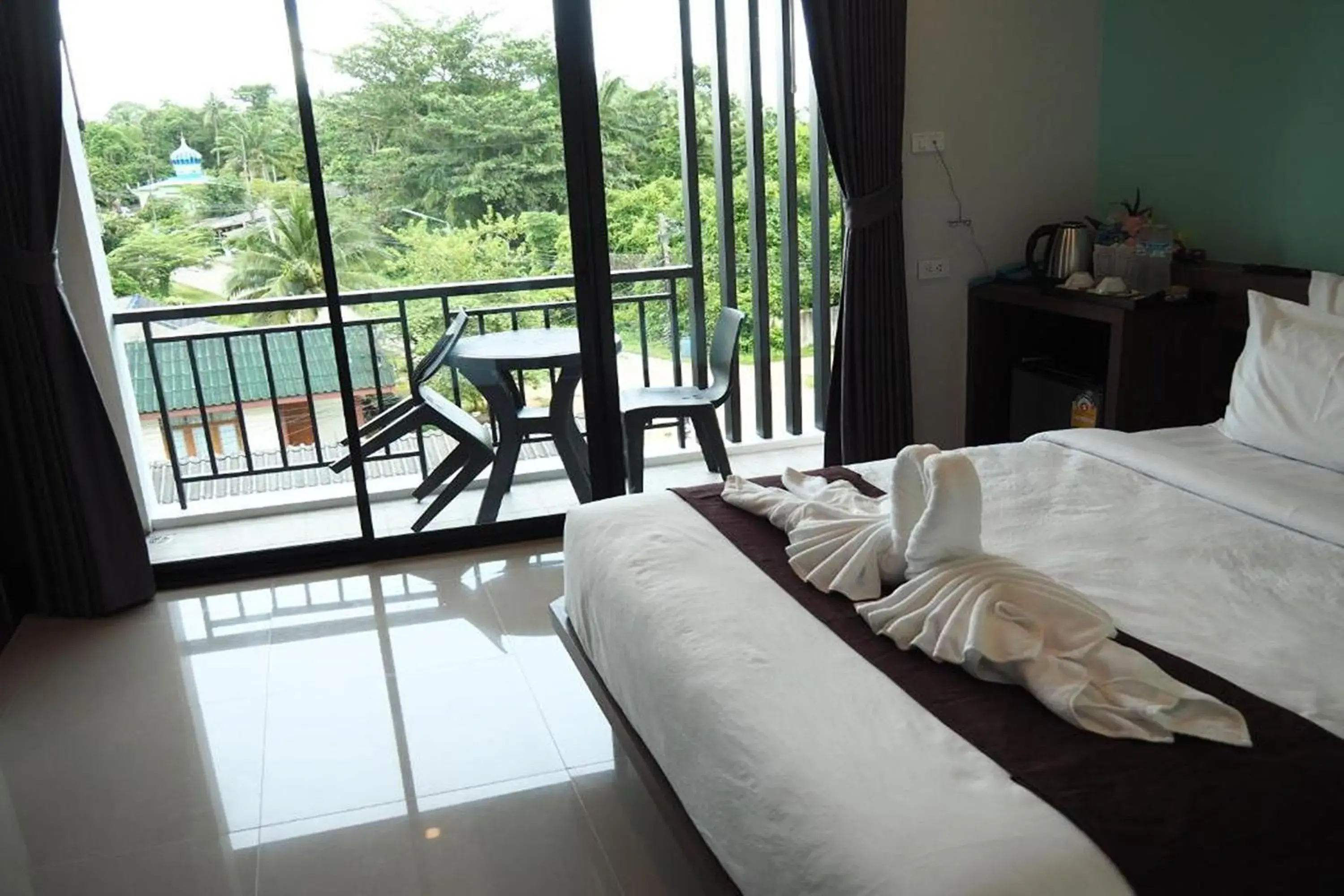 Triple Room with Balcony in Friendly Hotel Krabi Triple Room with Balcony in Friendly Hotel Krabi