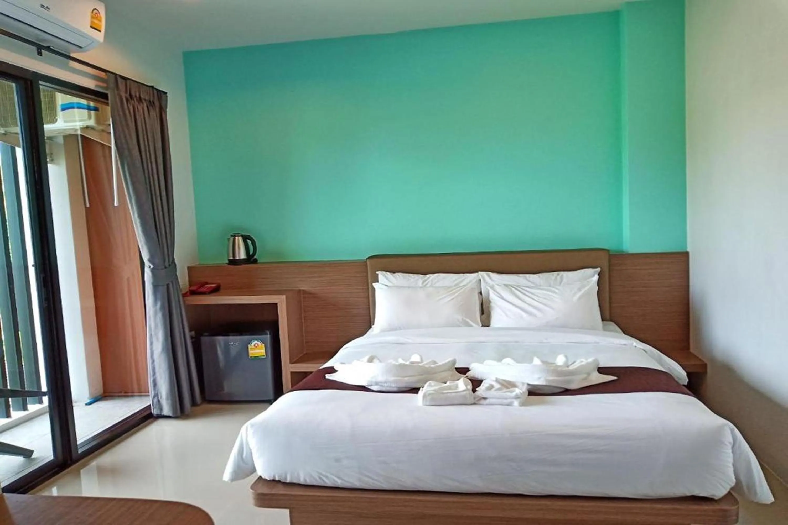 Photo of the whole room, Bed in Friendly Hotel Krabi