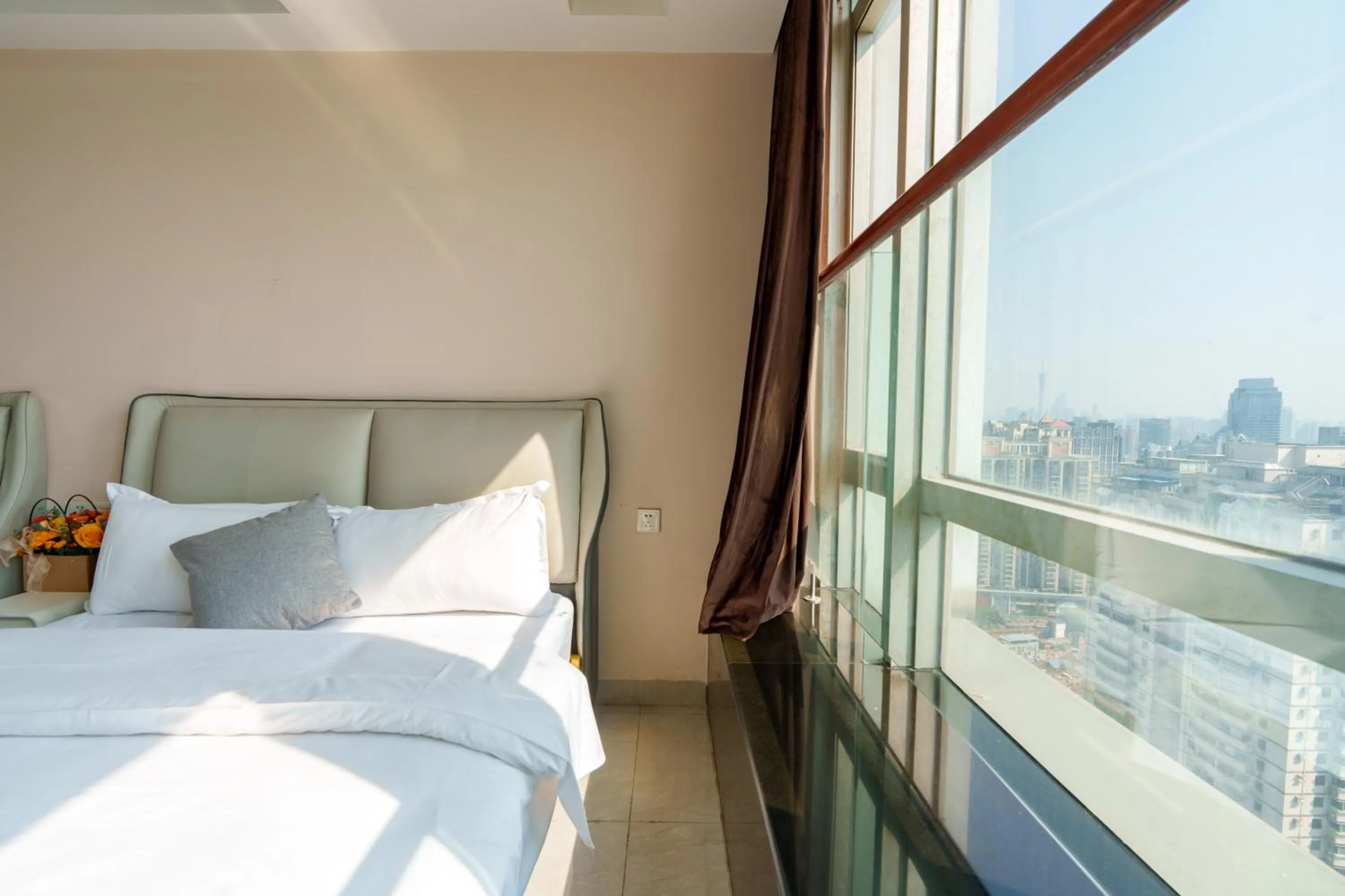 Property building, Bed in Sunny International Apartment From Beijing Road