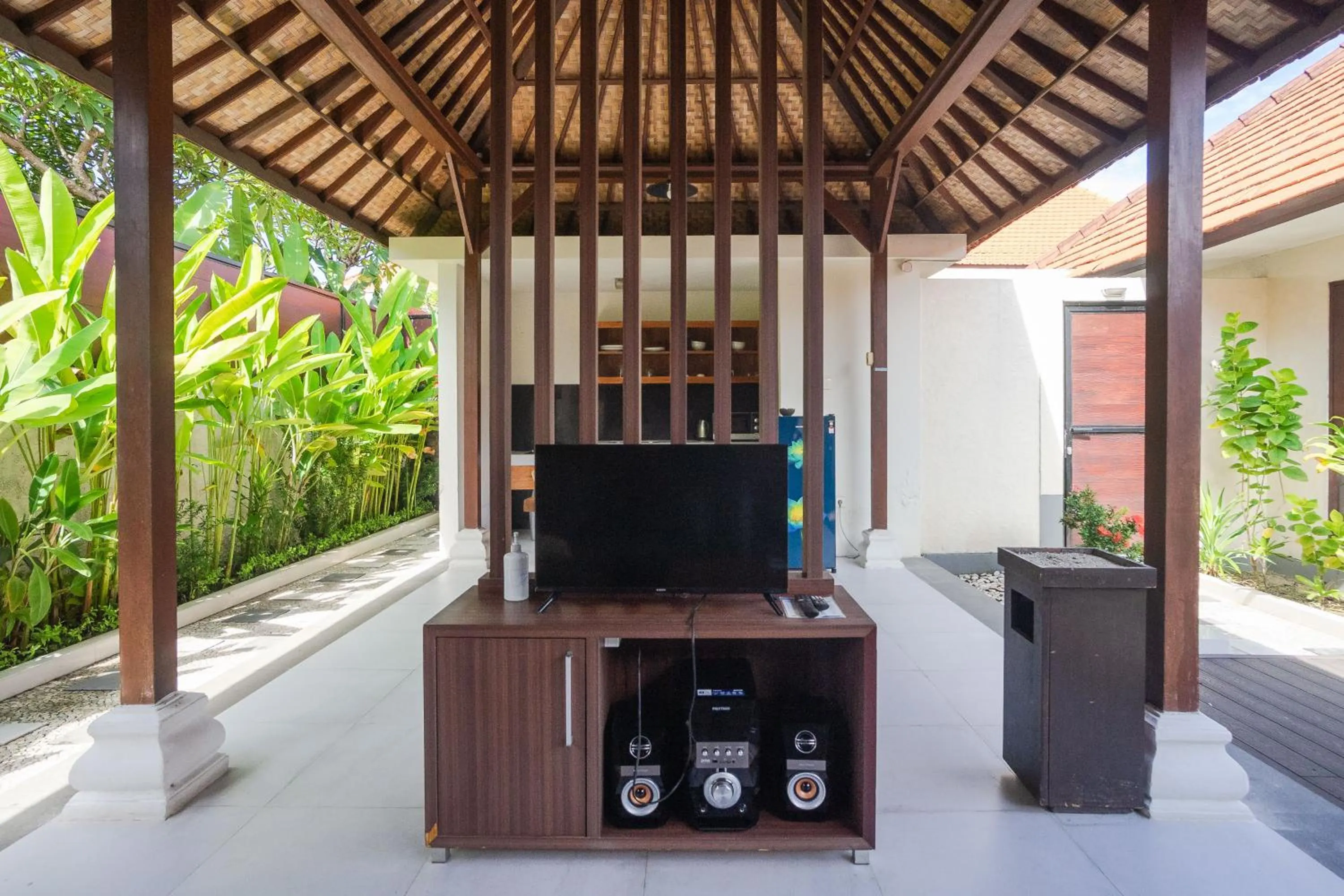 Communal lounge/ TV room in The Awan Villas Seminyak