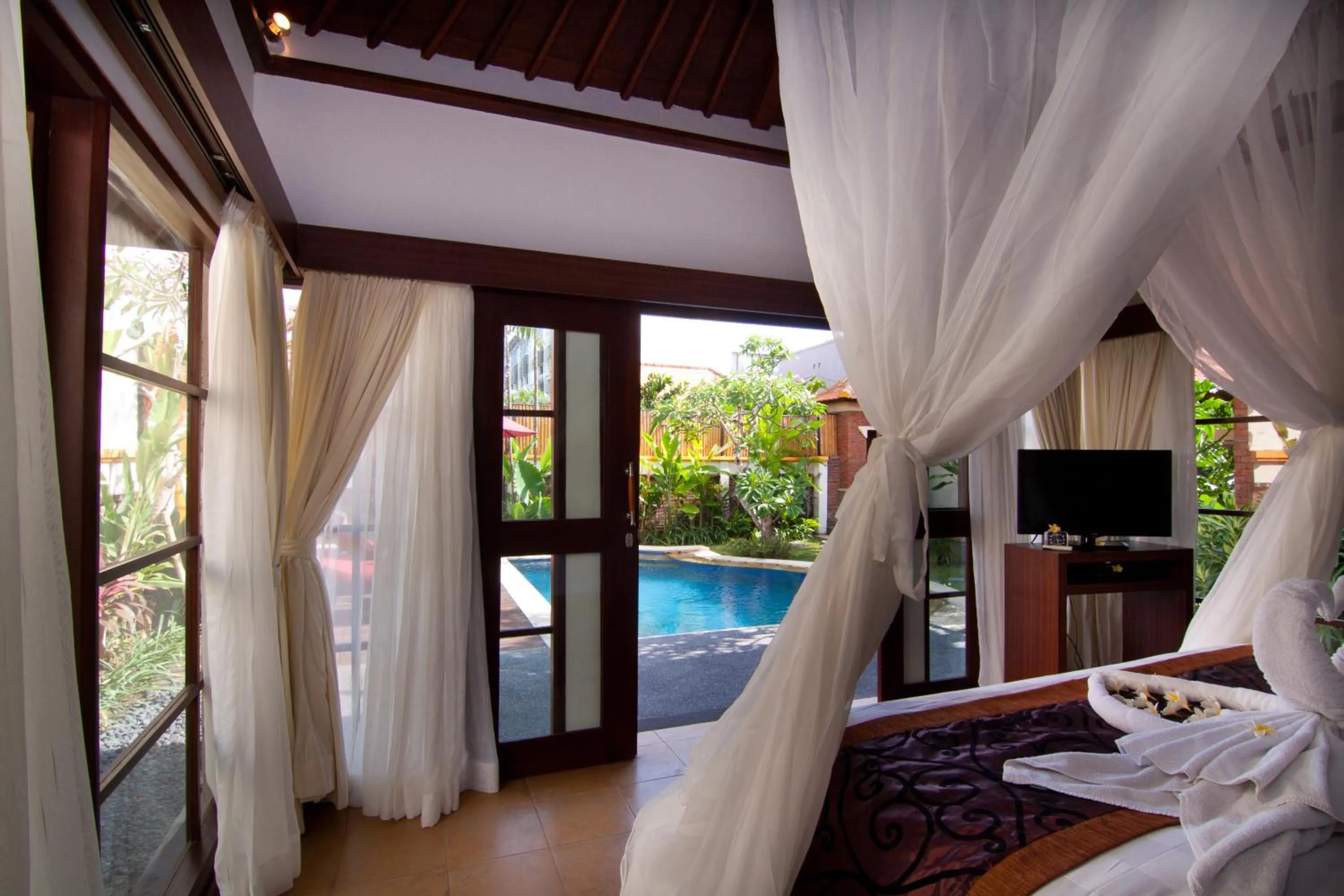 Photo of the whole room, Bed in The Awan Villas Seminyak