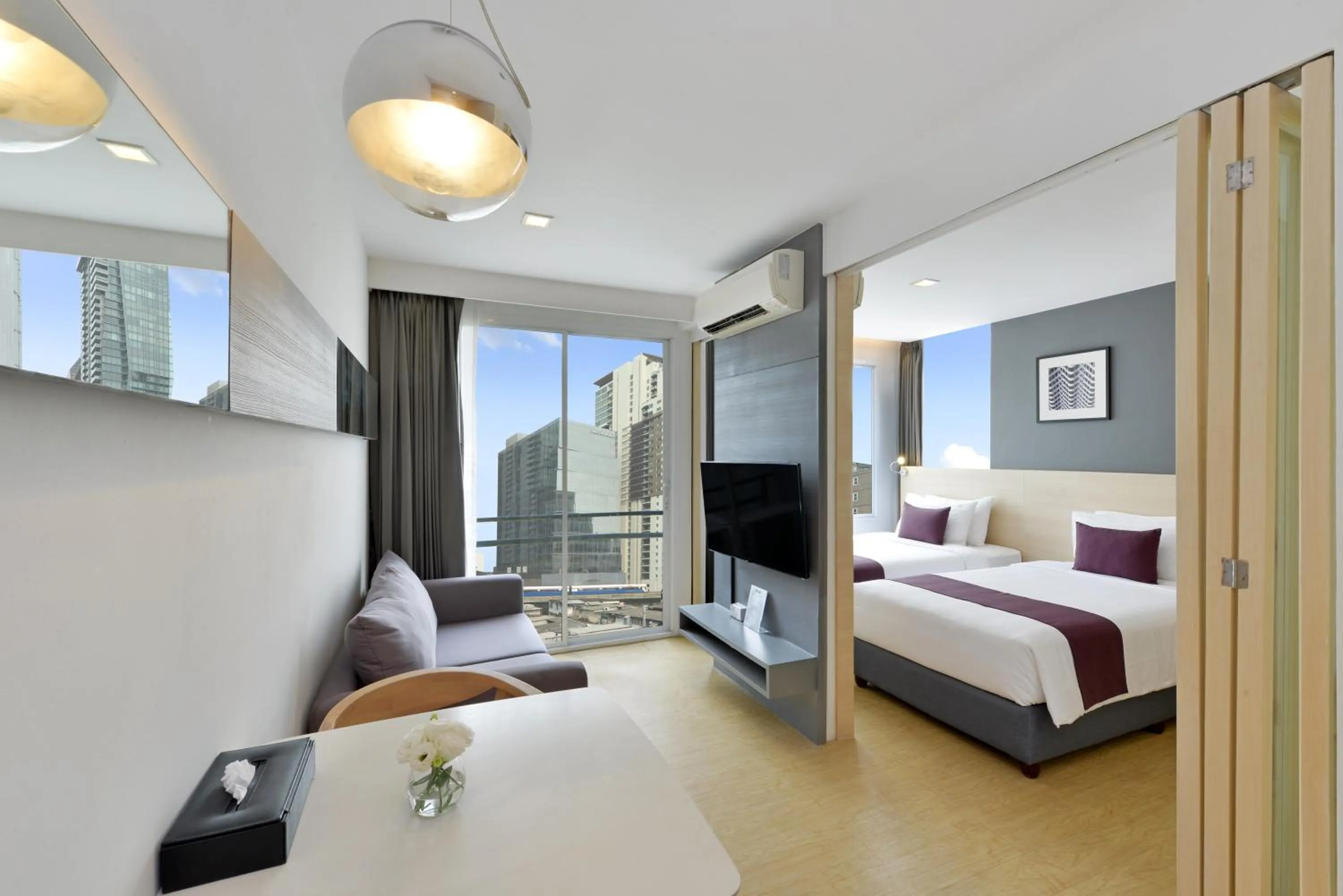 Photo of the whole room, Bed in Arize Hotel Sukhumvit