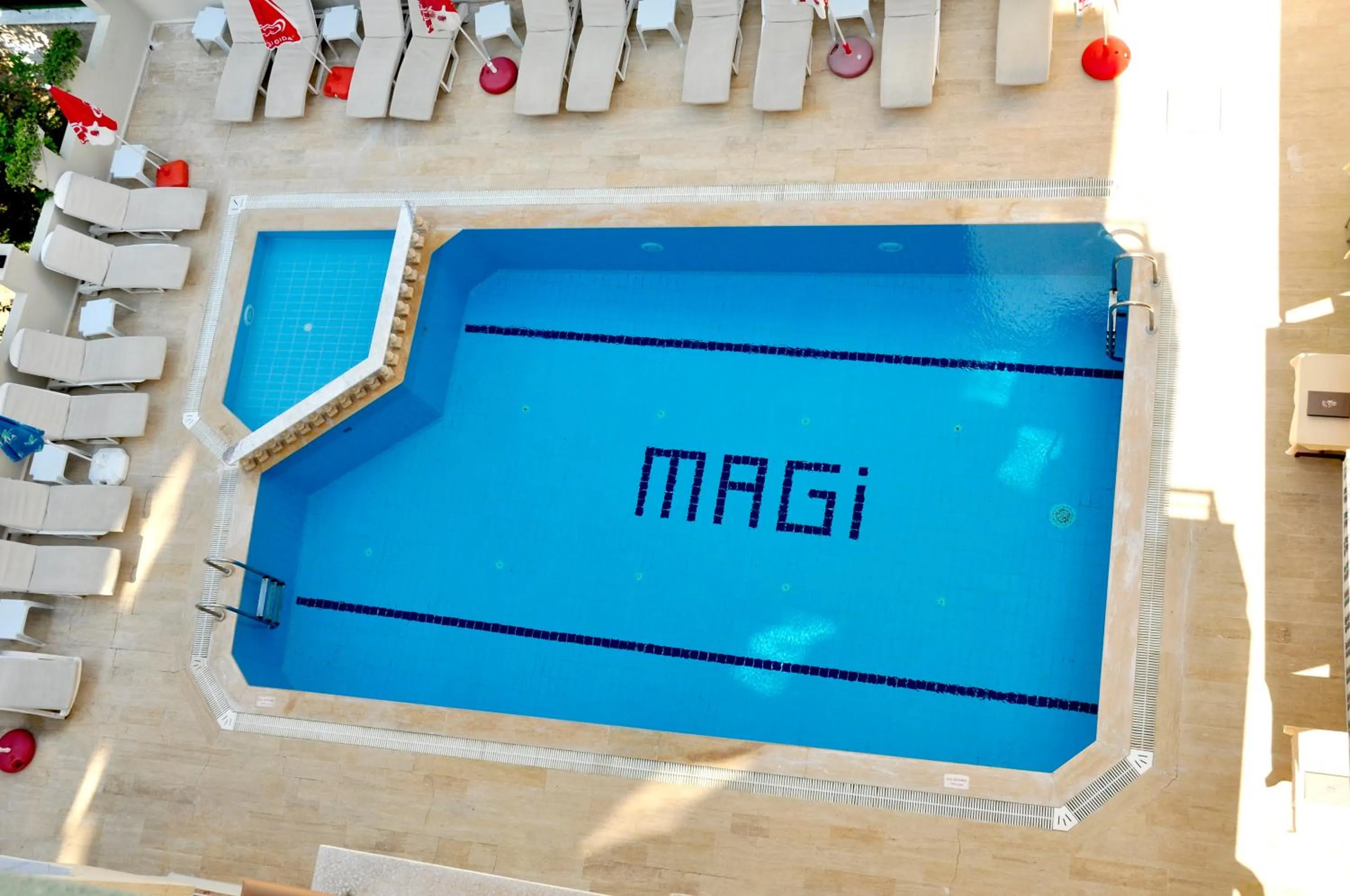 Swimming pool in Magi Apart Hotel