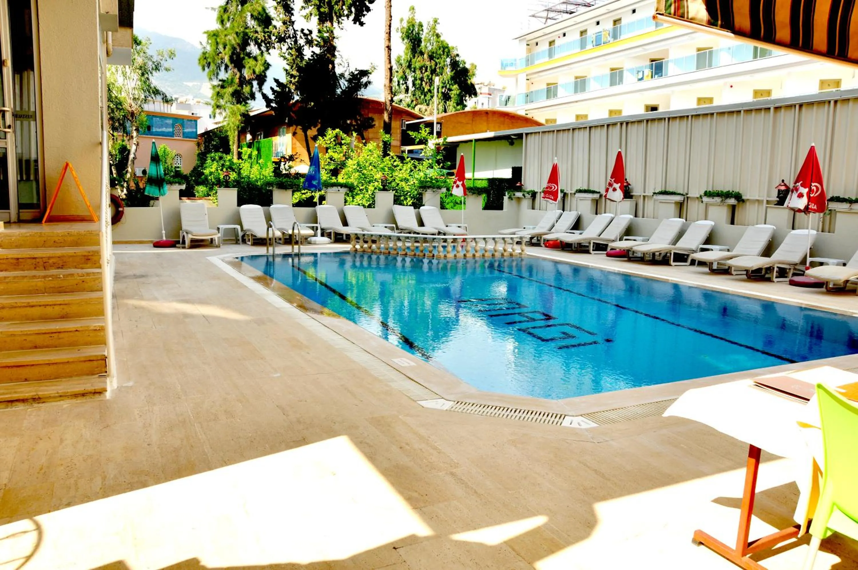 Swimming pool in Magi Apart Hotel