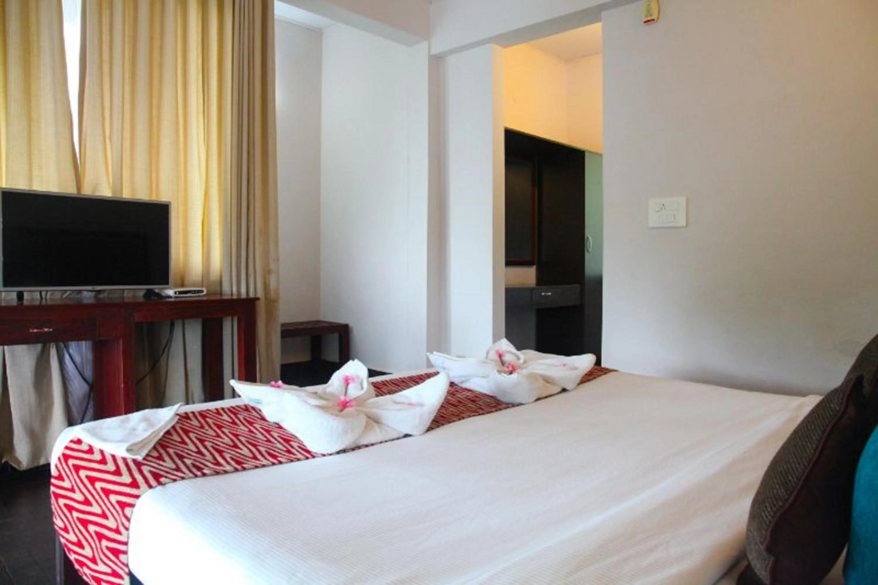 Bed in Kalathil Lake Resort