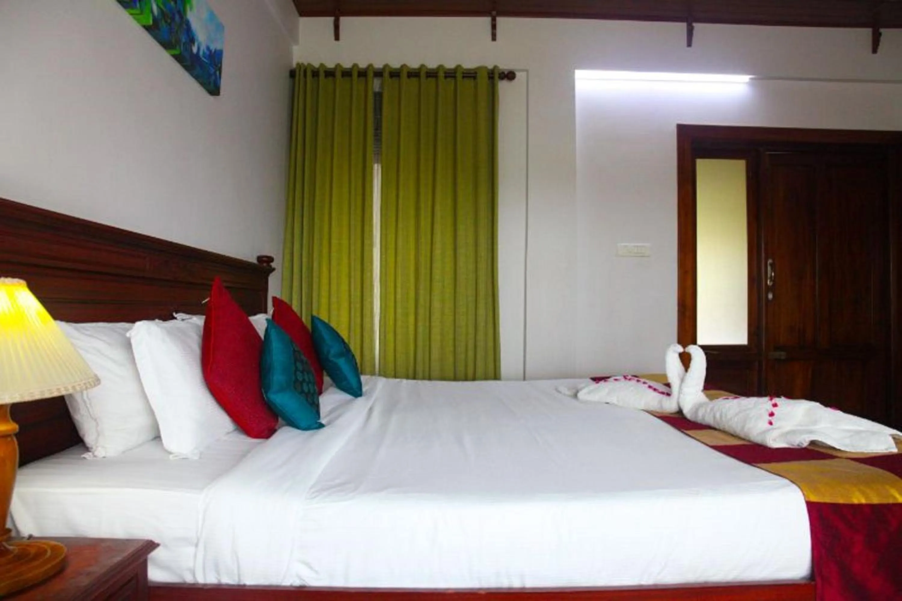 Bed in Kalathil Lake Resort