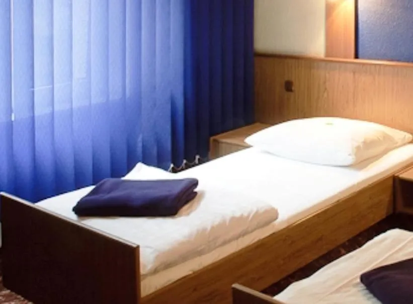 Bed in Hotel Victoria