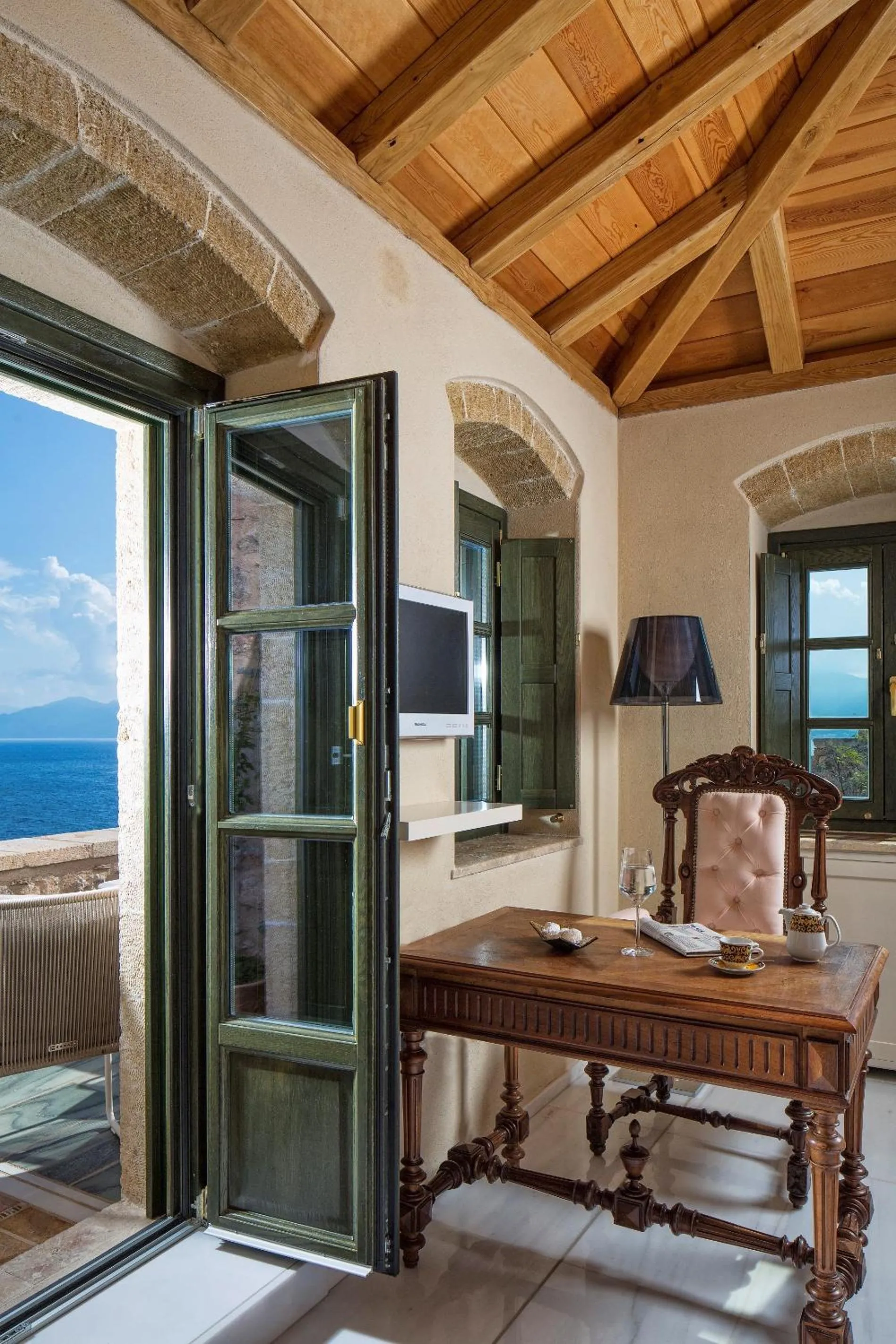 Seating area in Moni Emvasis Luxury Suites