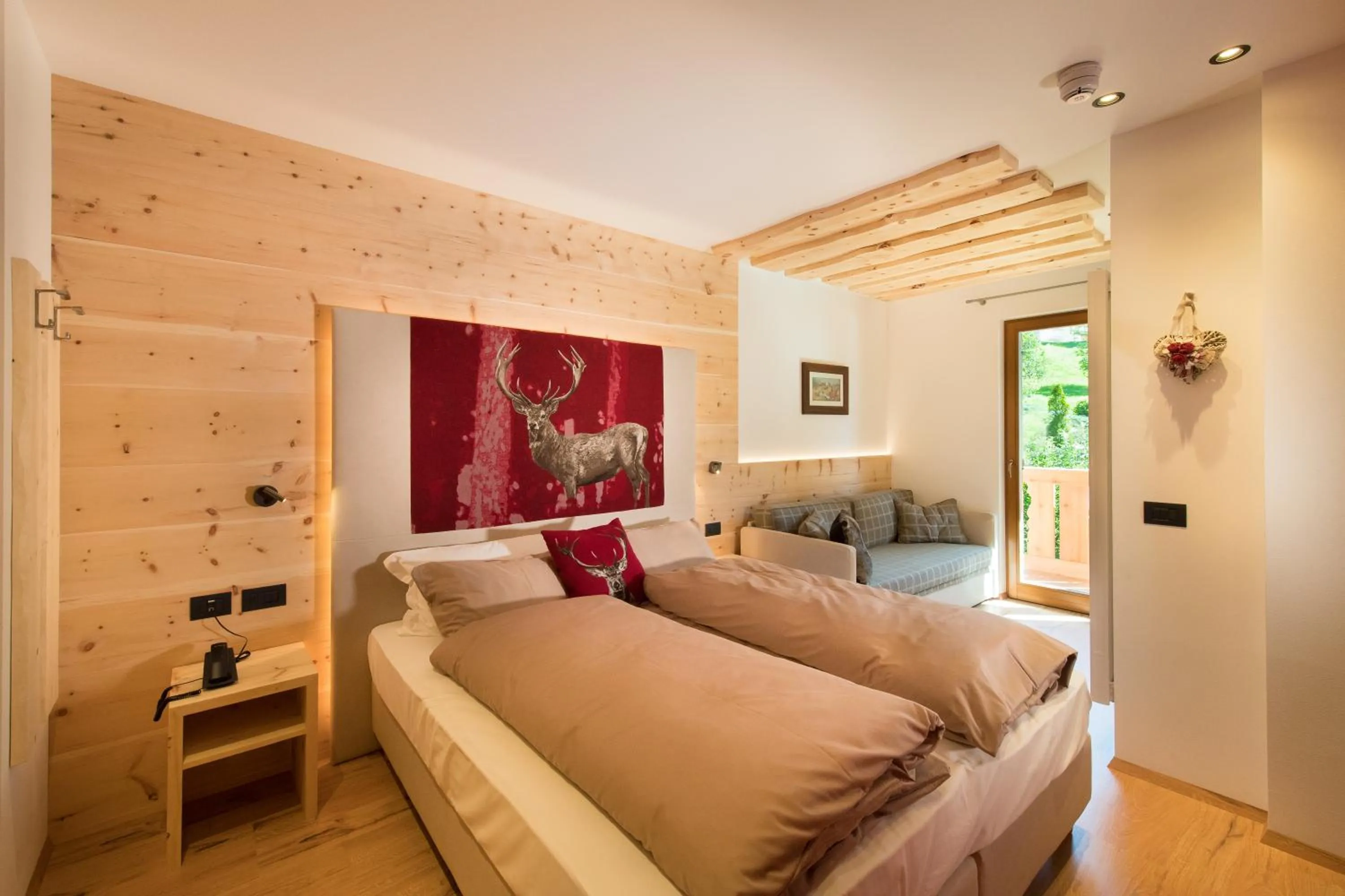 Photo of the whole room, Bed in Hotel Patrizia Dolomites Glamour