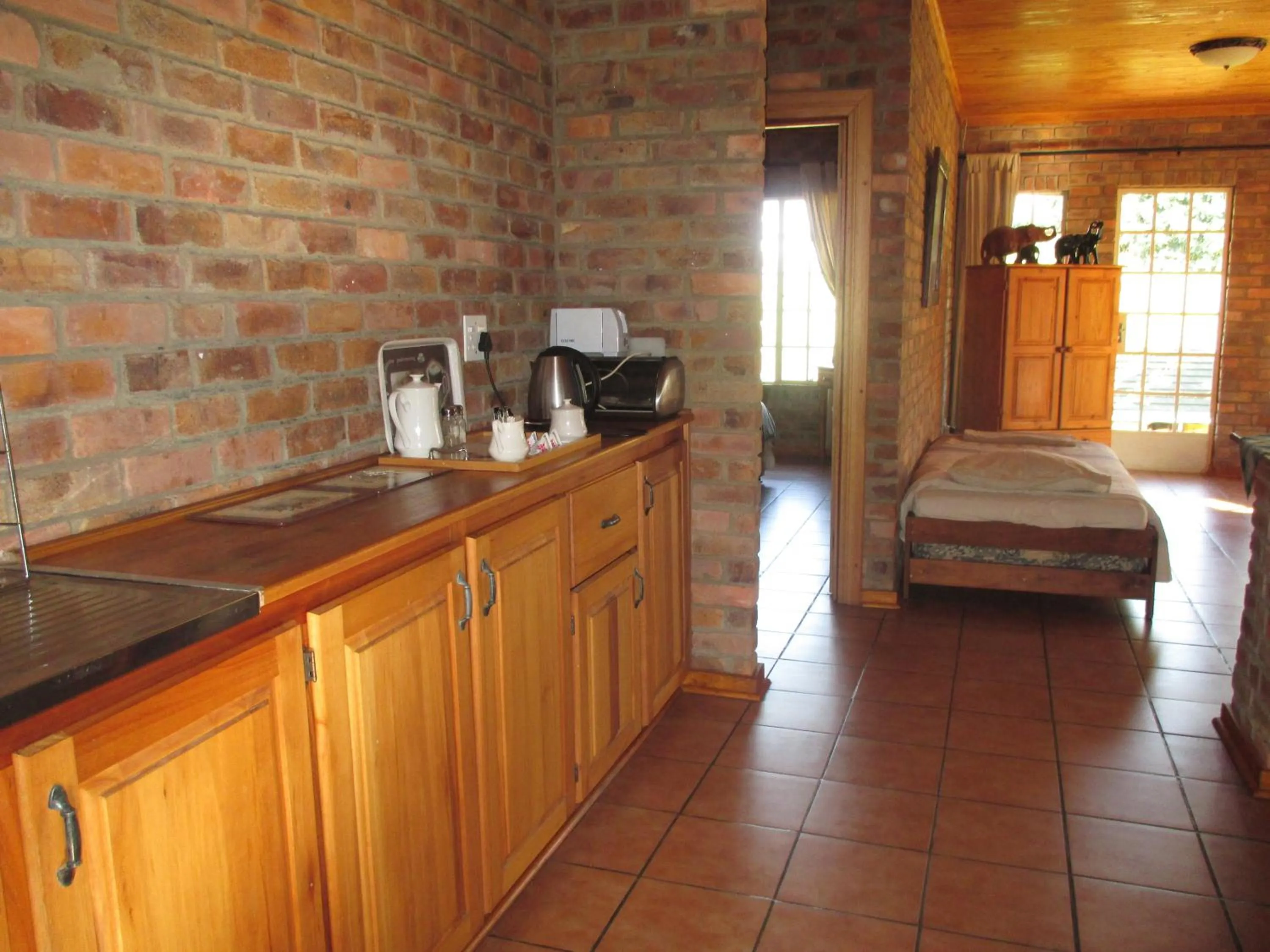 Photo of the whole room, Bed in Thaba Tsweni Lodge & Safaris