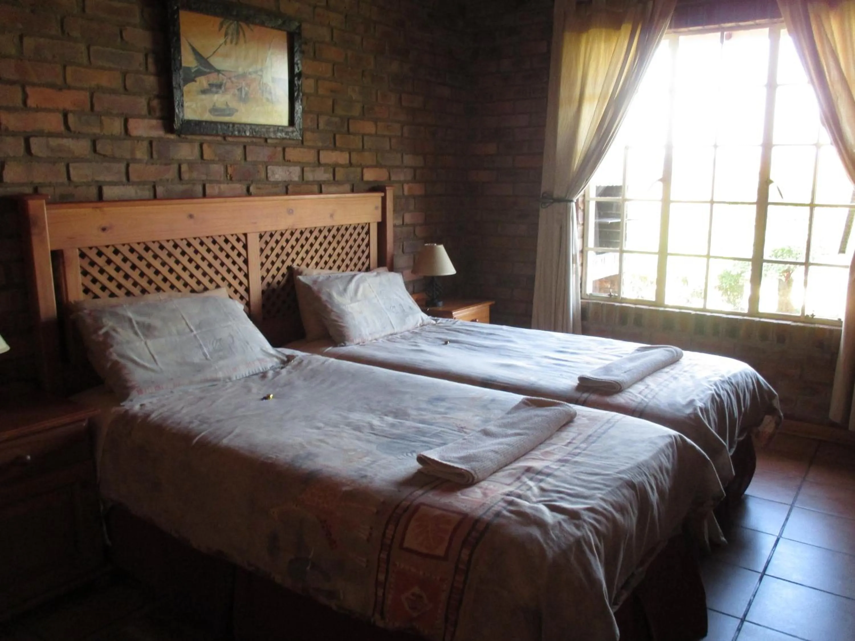 Bed in Thaba Tsweni Lodge & Safaris
