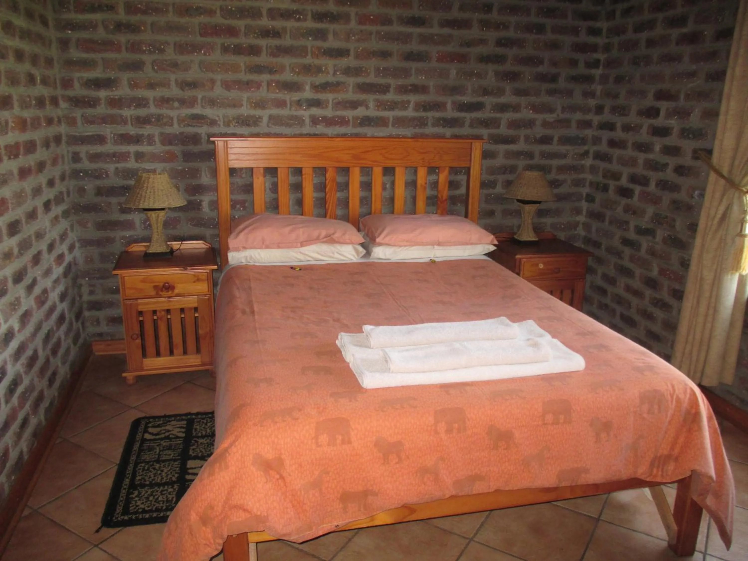 Bed in Thaba Tsweni Lodge & Safaris