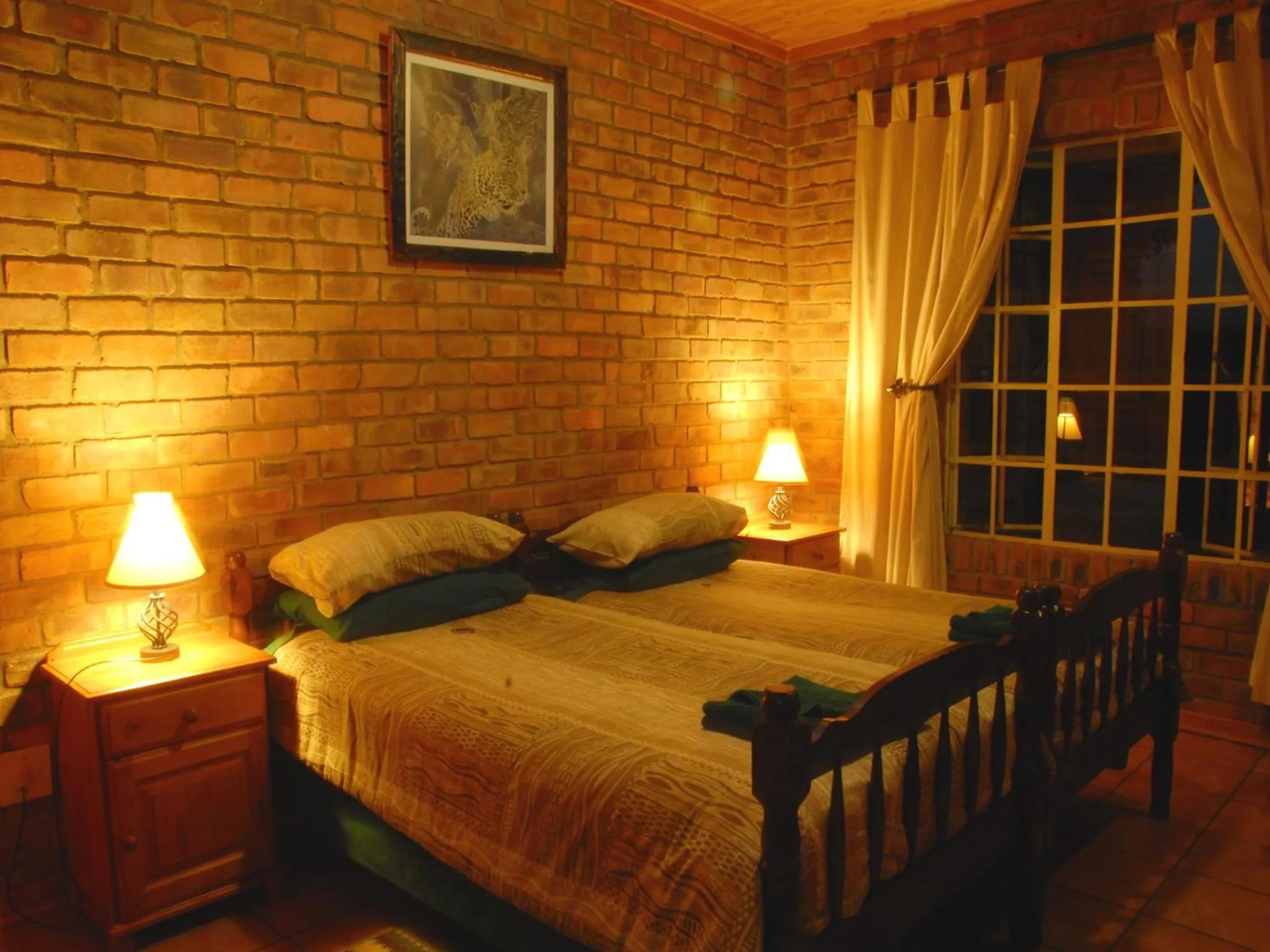 Bed in Thaba Tsweni Lodge & Safaris