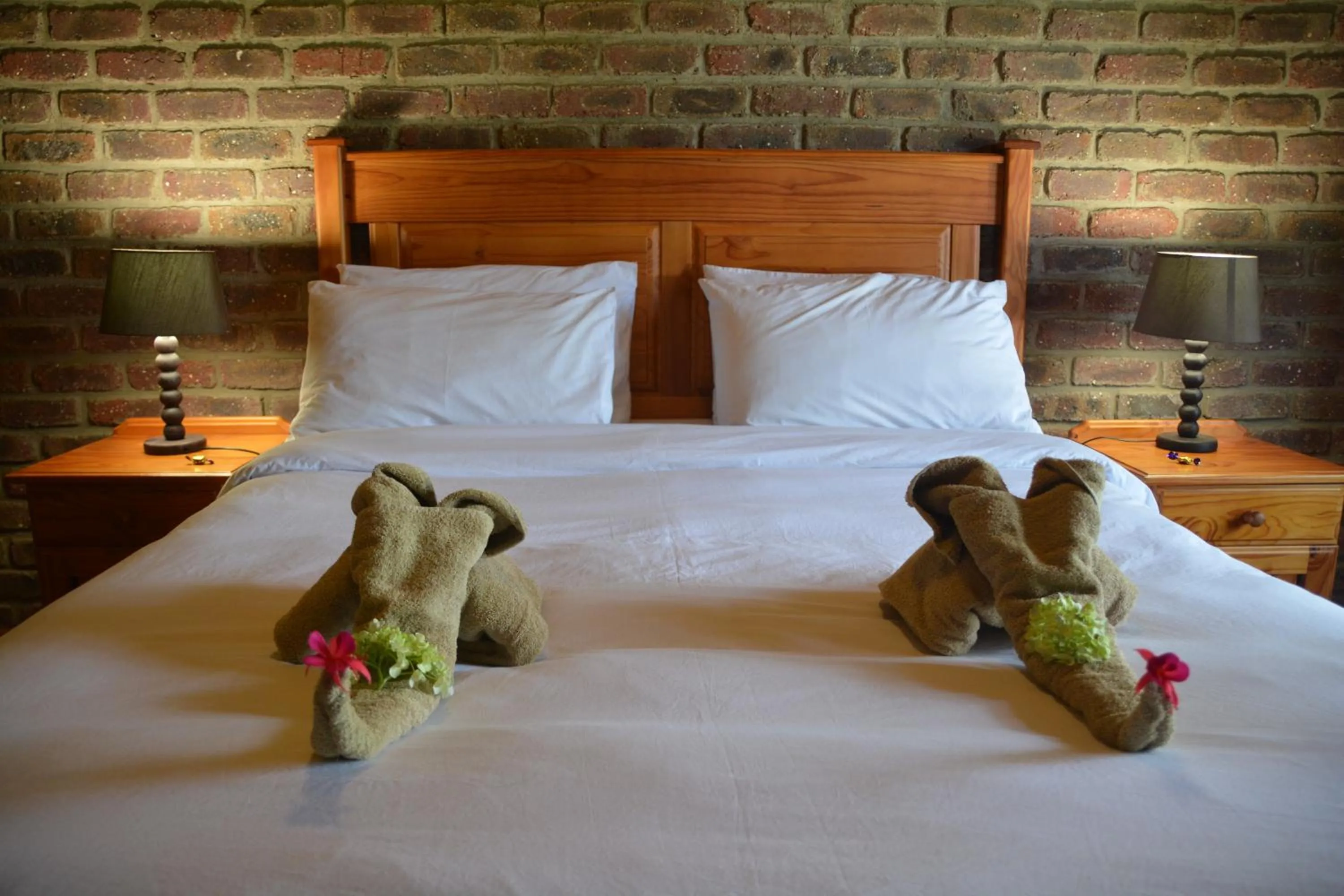 Bed in Thaba Tsweni Lodge & Safaris