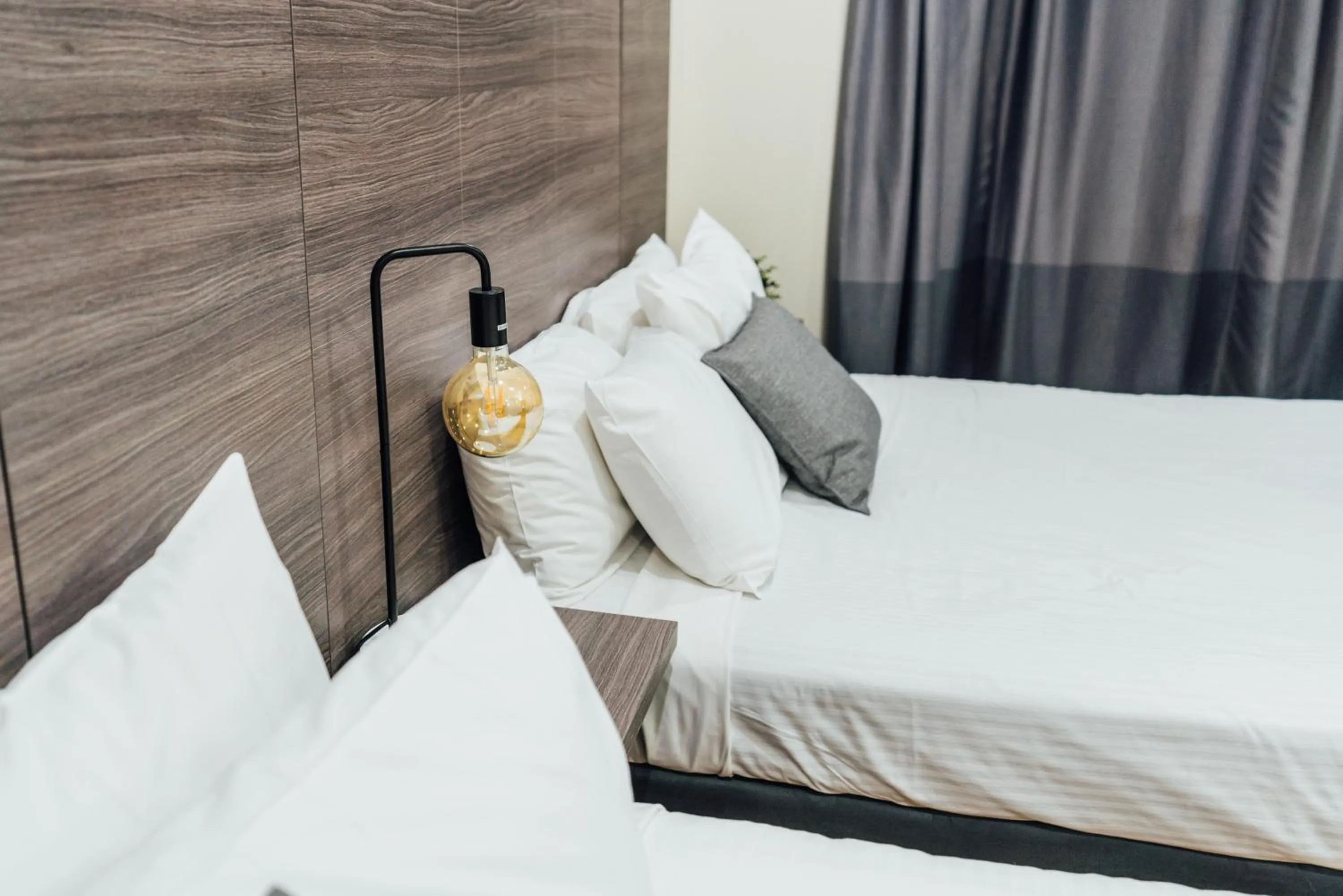 Bed in UNO Hotel Sydney