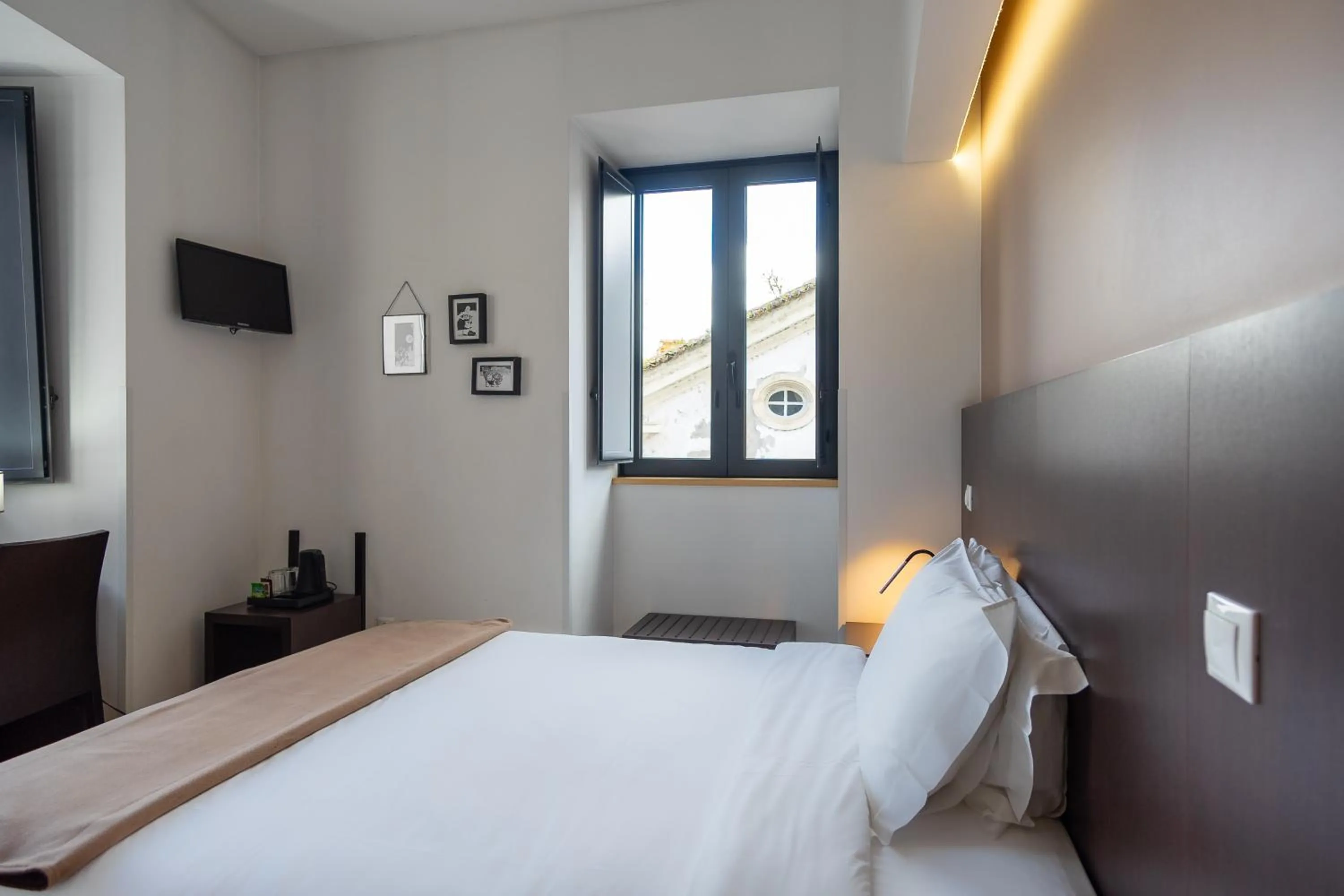 Bed in Hotel Vitória