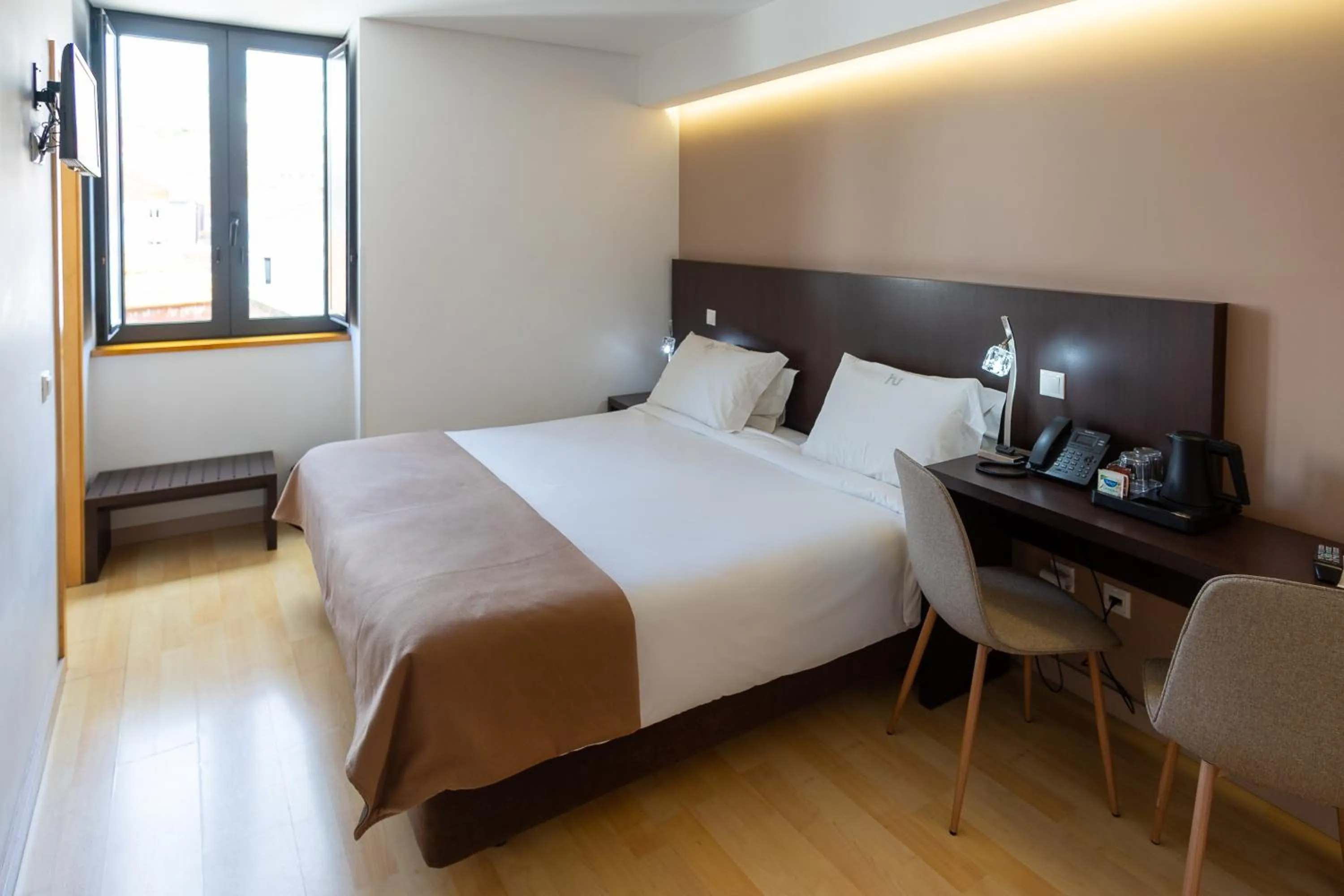 Bed in Hotel Vitória