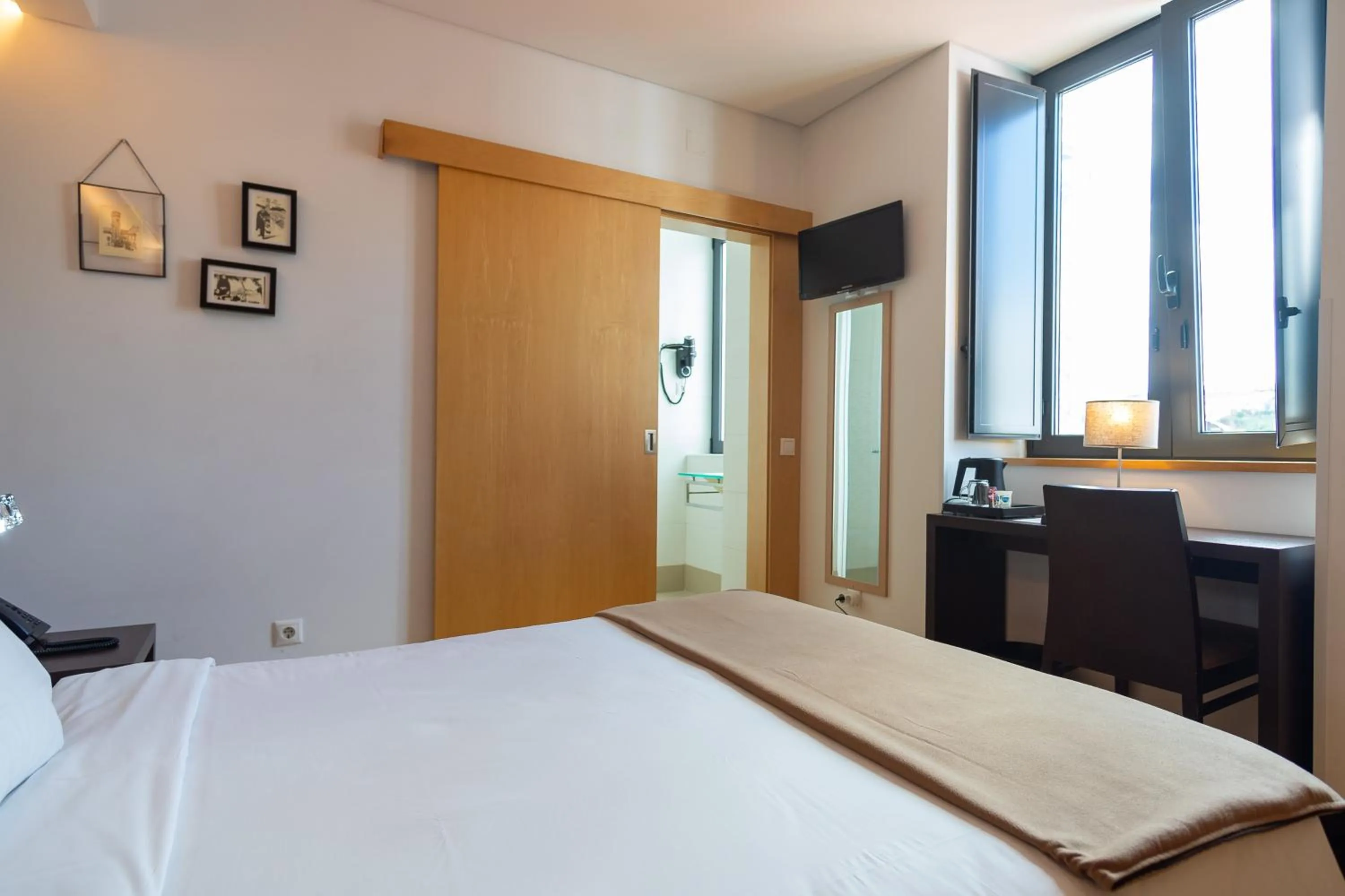 Bed in Hotel Vitória