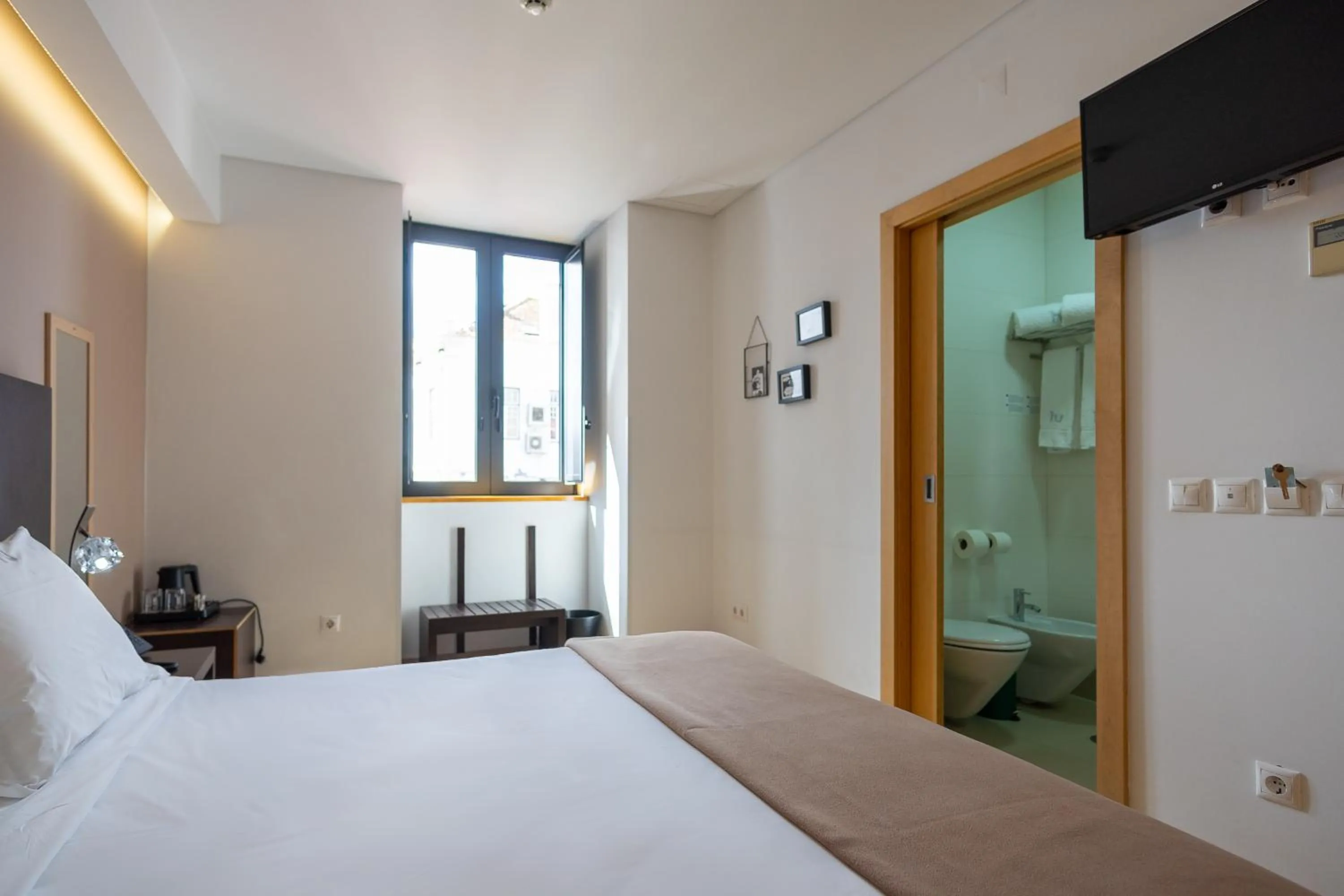 Bed in Hotel Vitória