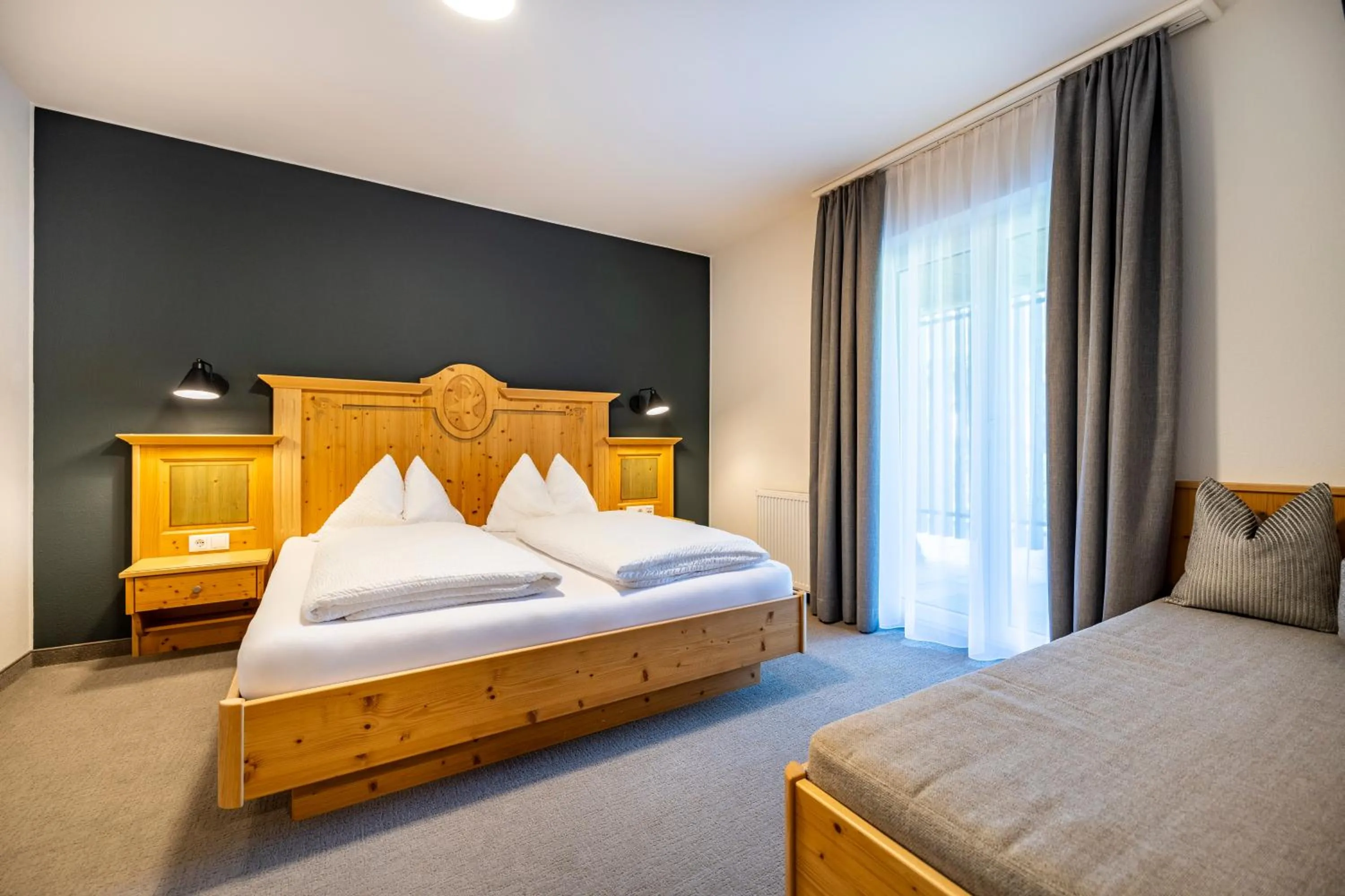 Photo of the whole room, Bed in Aparthotel Jägerheim