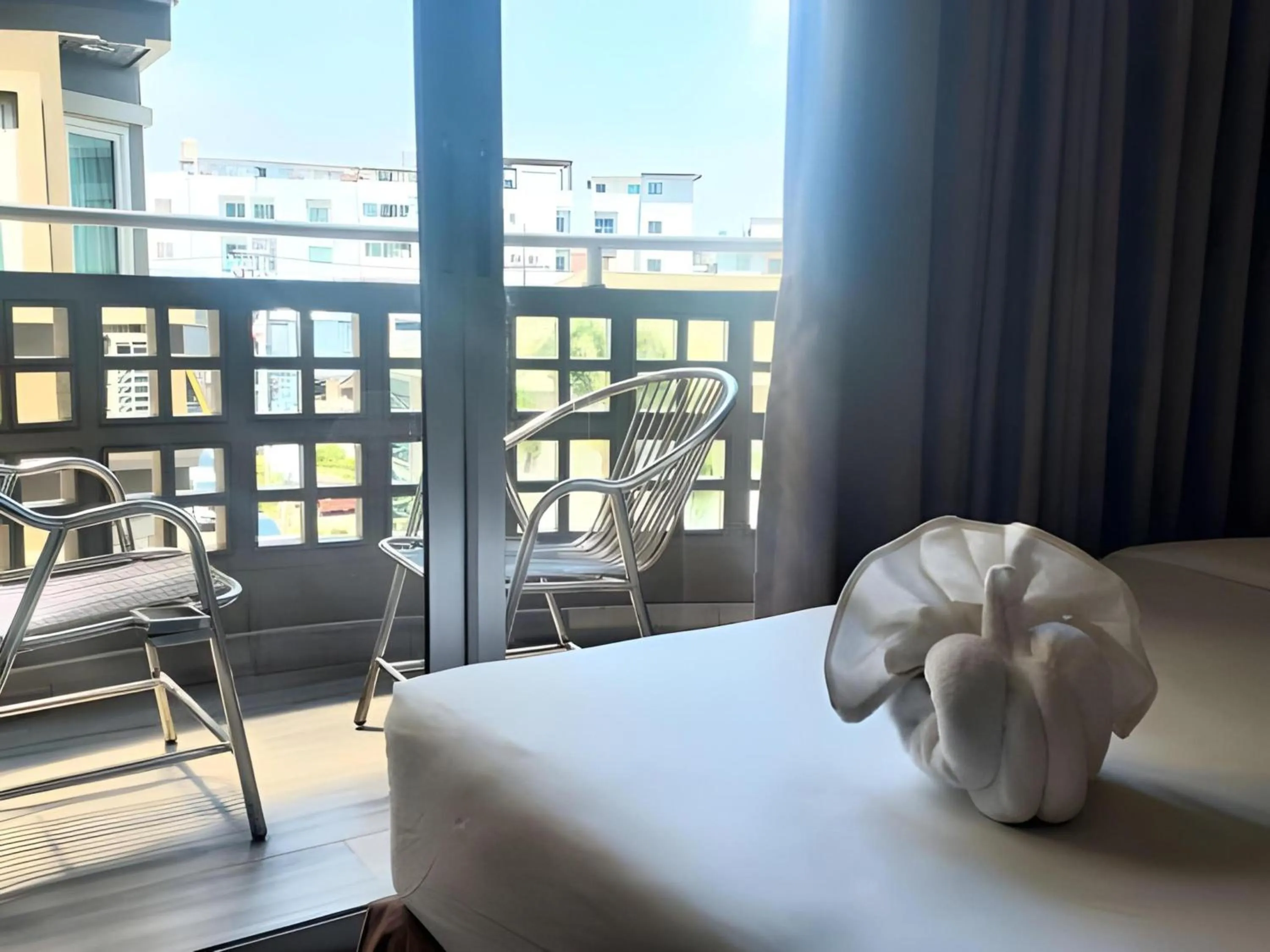 Bedroom, Bed in Sunday JA Plus Hotel