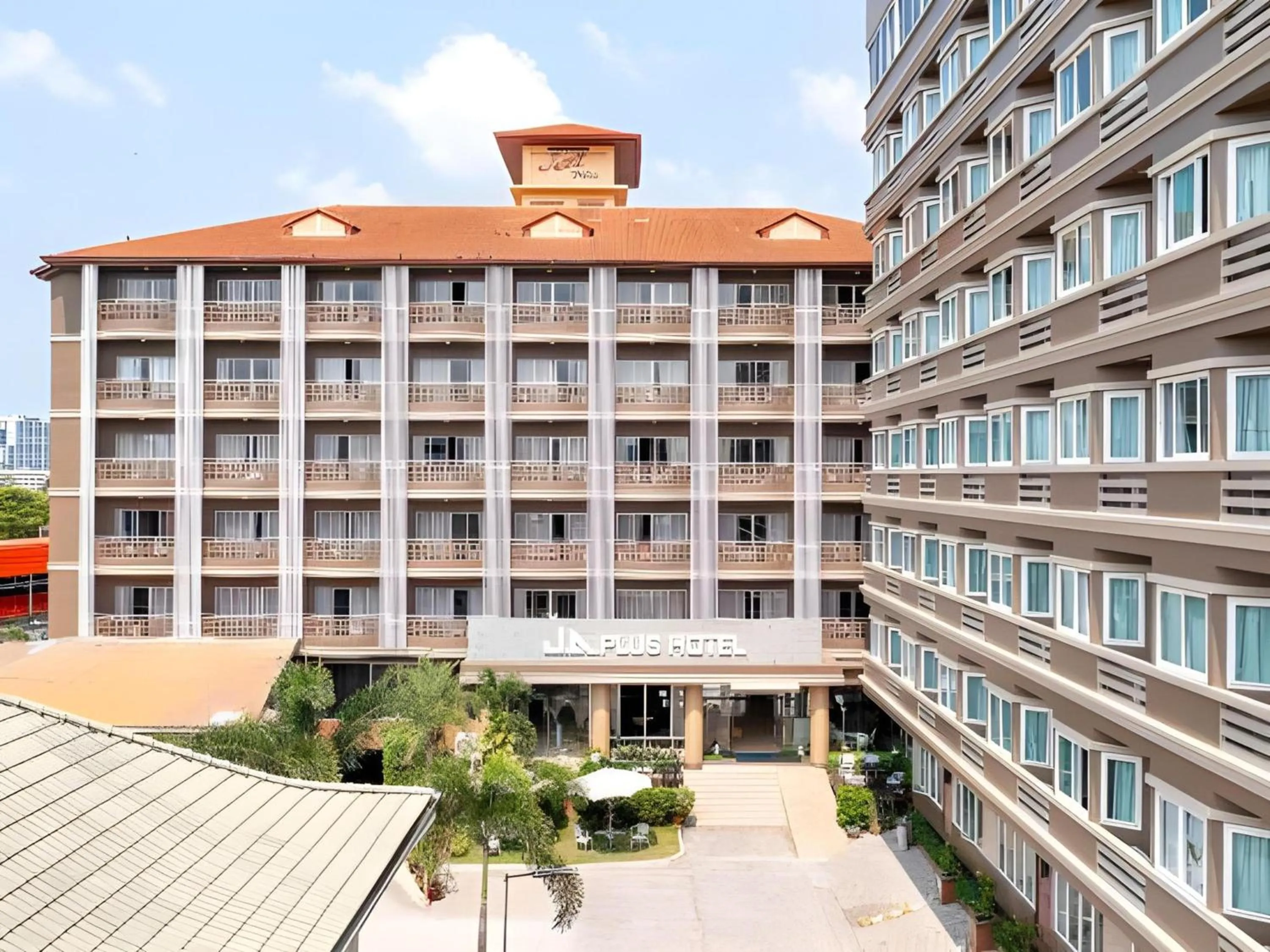 Property building in Sunday JA Plus Hotel