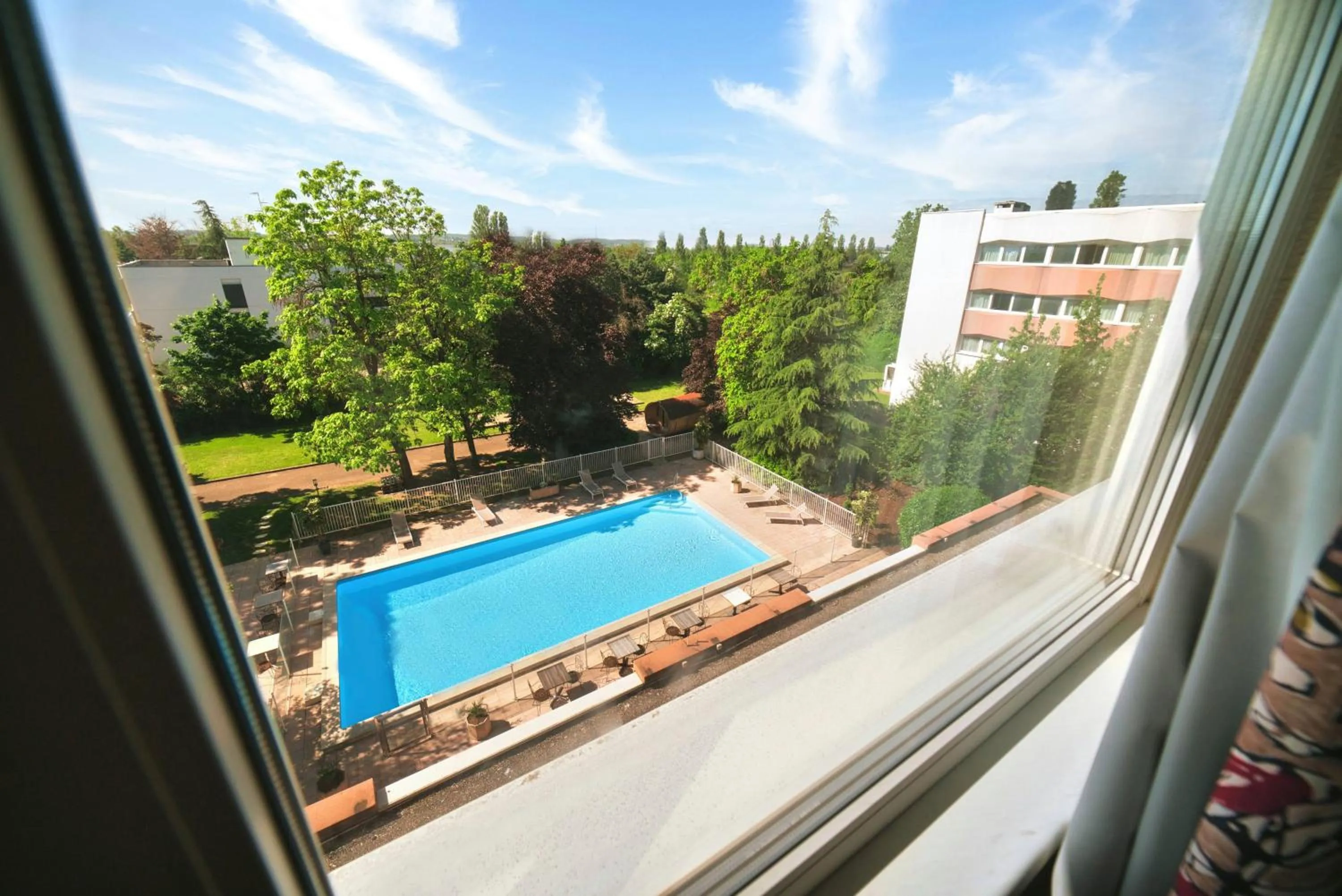 Pool view in Kyriad Prestige Mulhouse - Basel