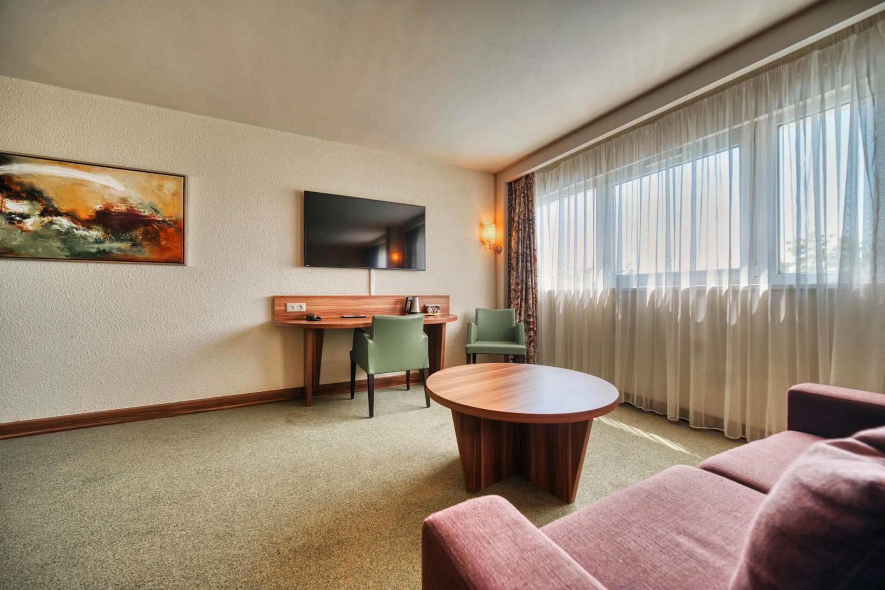 Living room in Kyriad Prestige Mulhouse - Basel