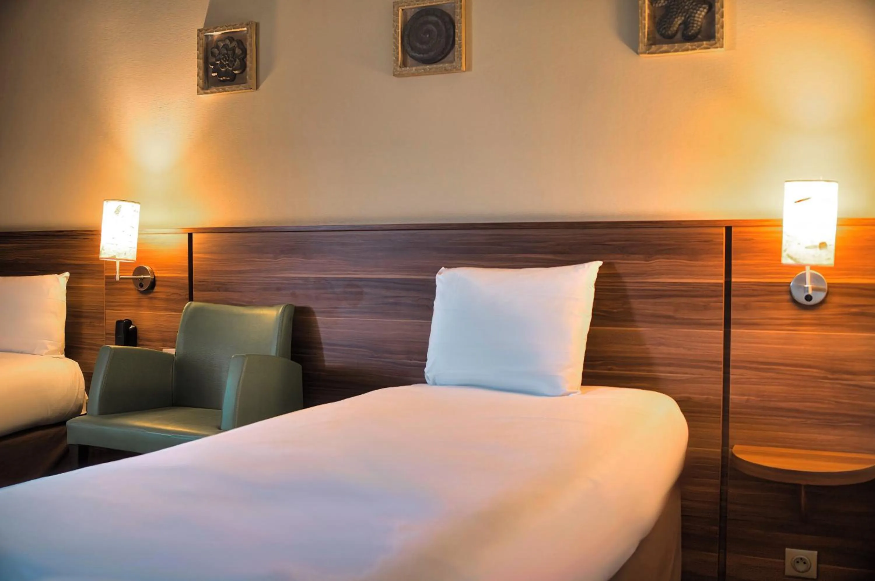 Bed in Kyriad Prestige Mulhouse - Basel