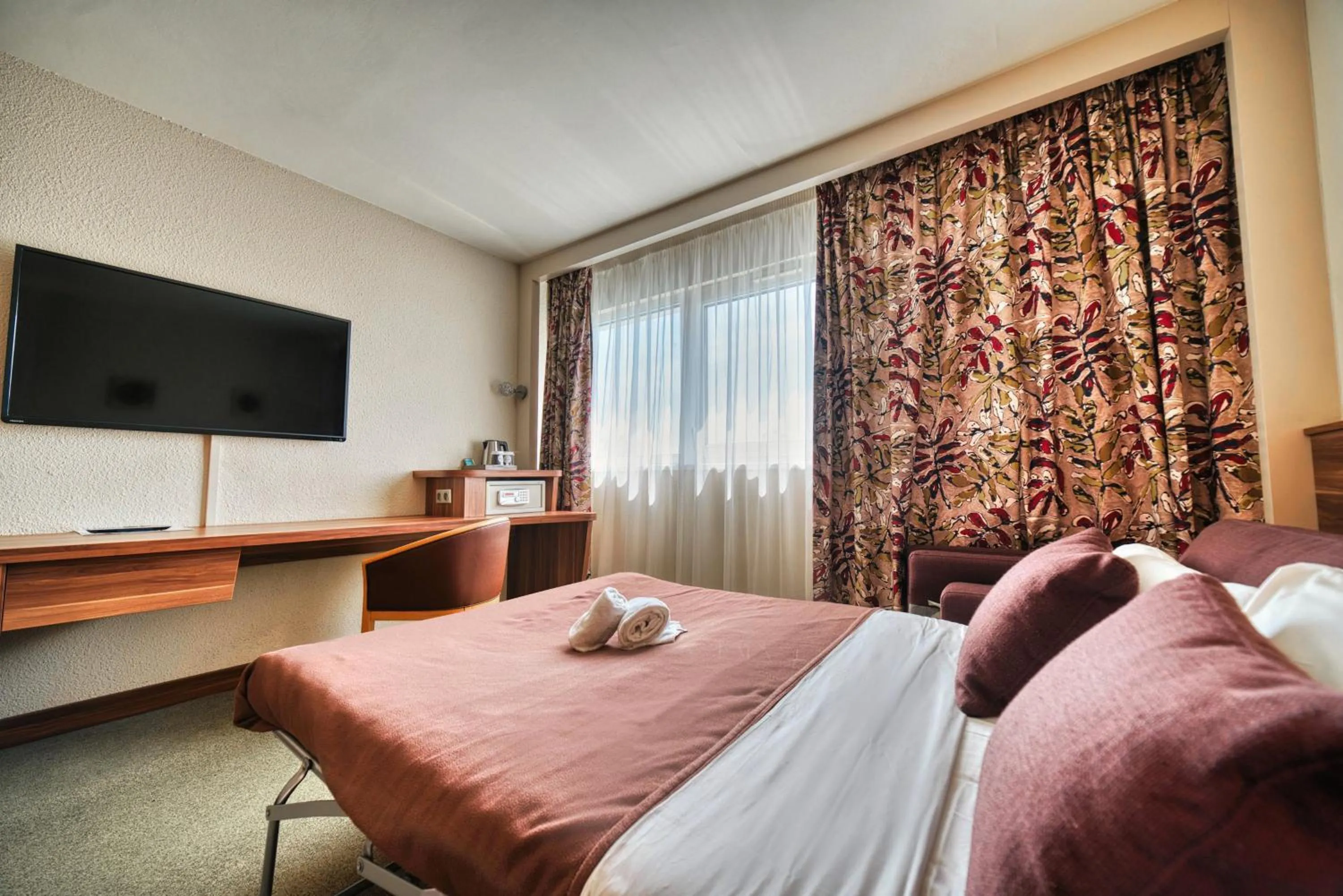 Bed in Kyriad Prestige Mulhouse - Basel