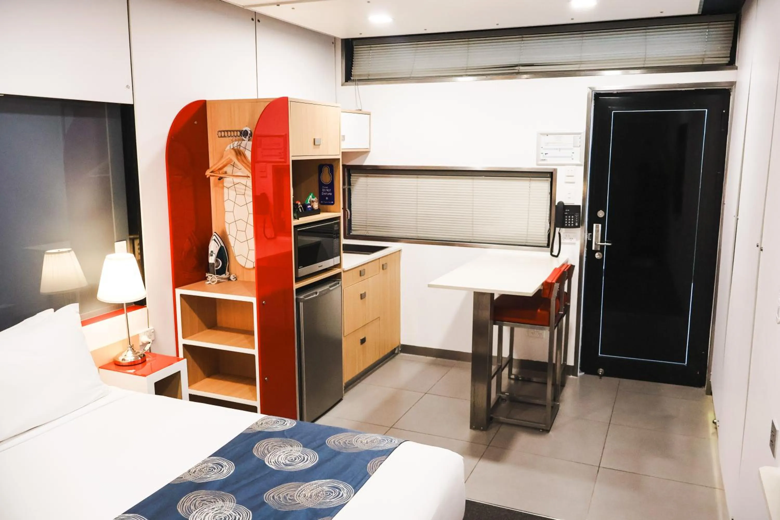 Kitchen or kitchenette, Bed in Stay Motel - Formerly Room Motels Gympie