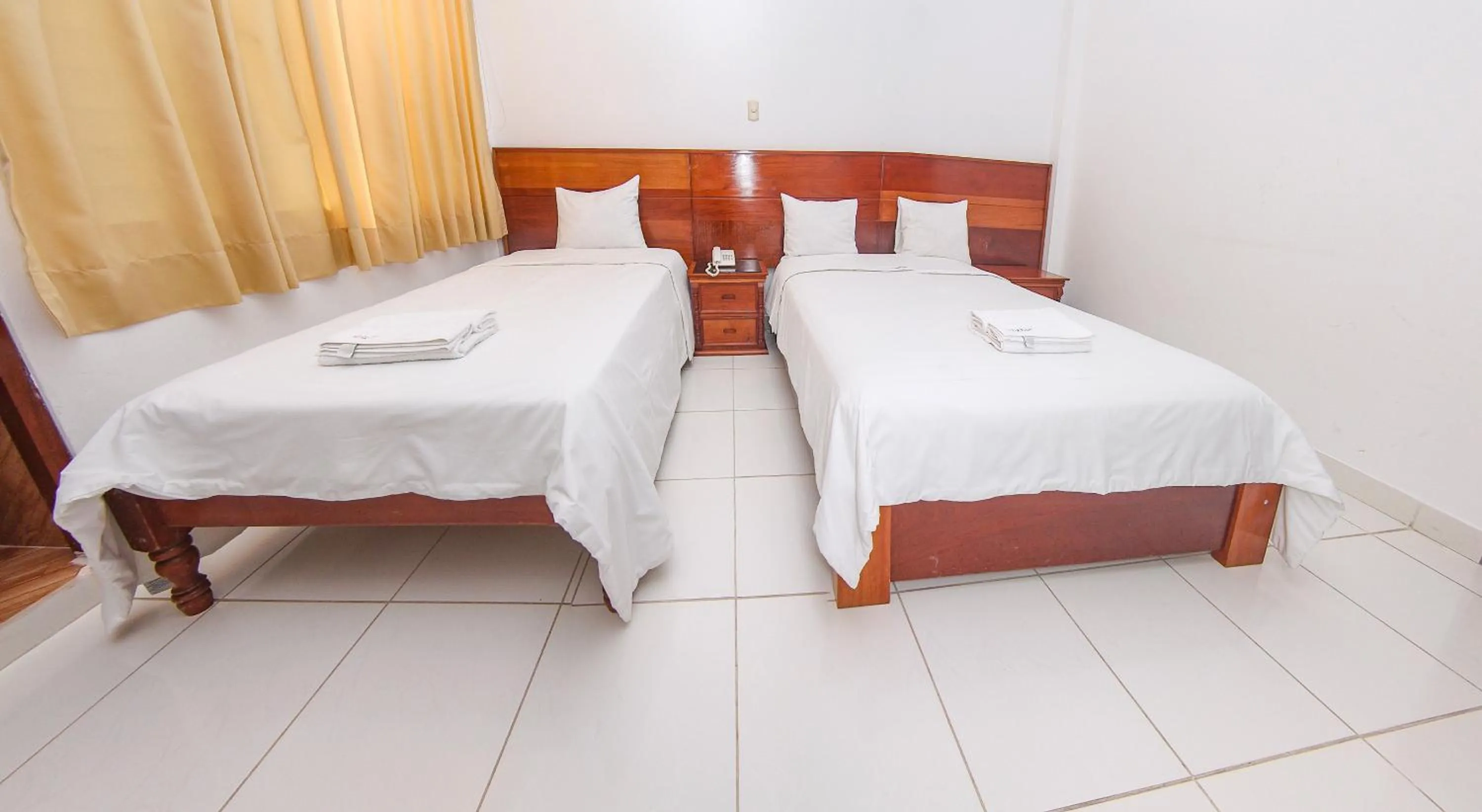 Bed in Hotel Rio Mayo