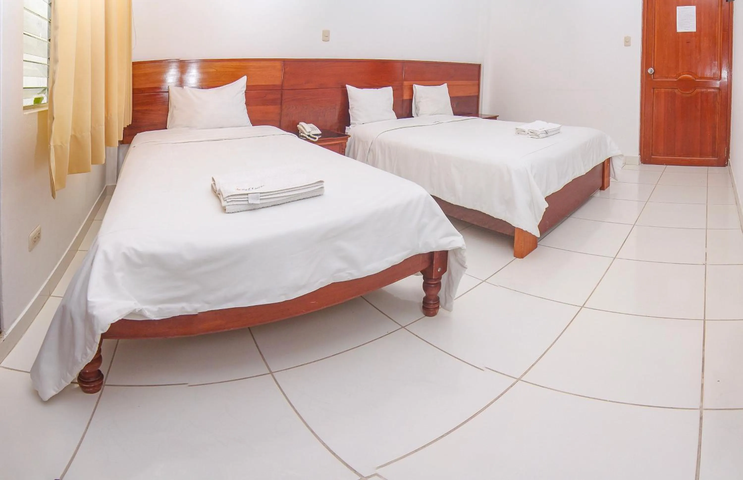 Bed in Hotel Rio Mayo