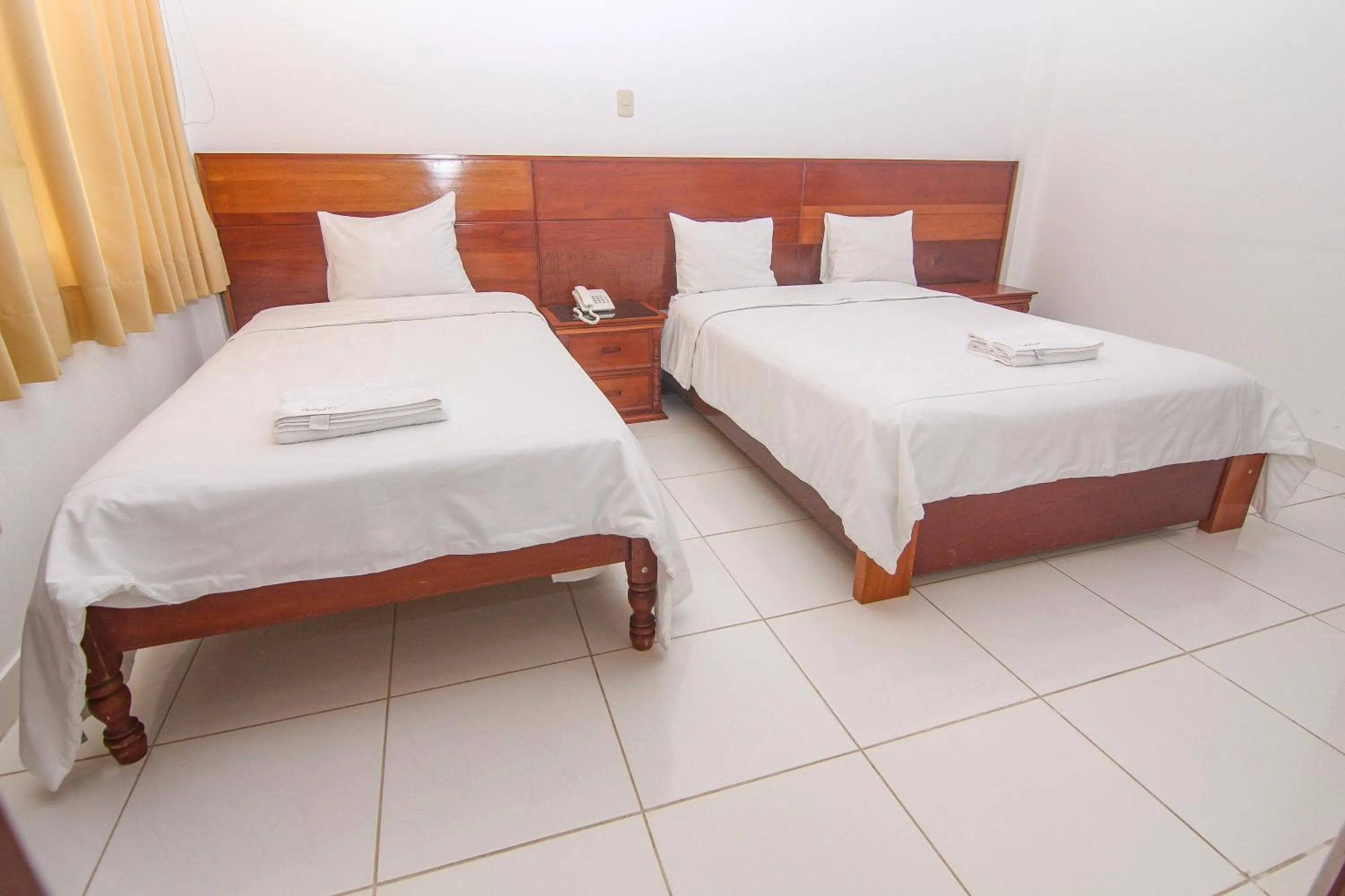 Bed in Hotel Rio Mayo