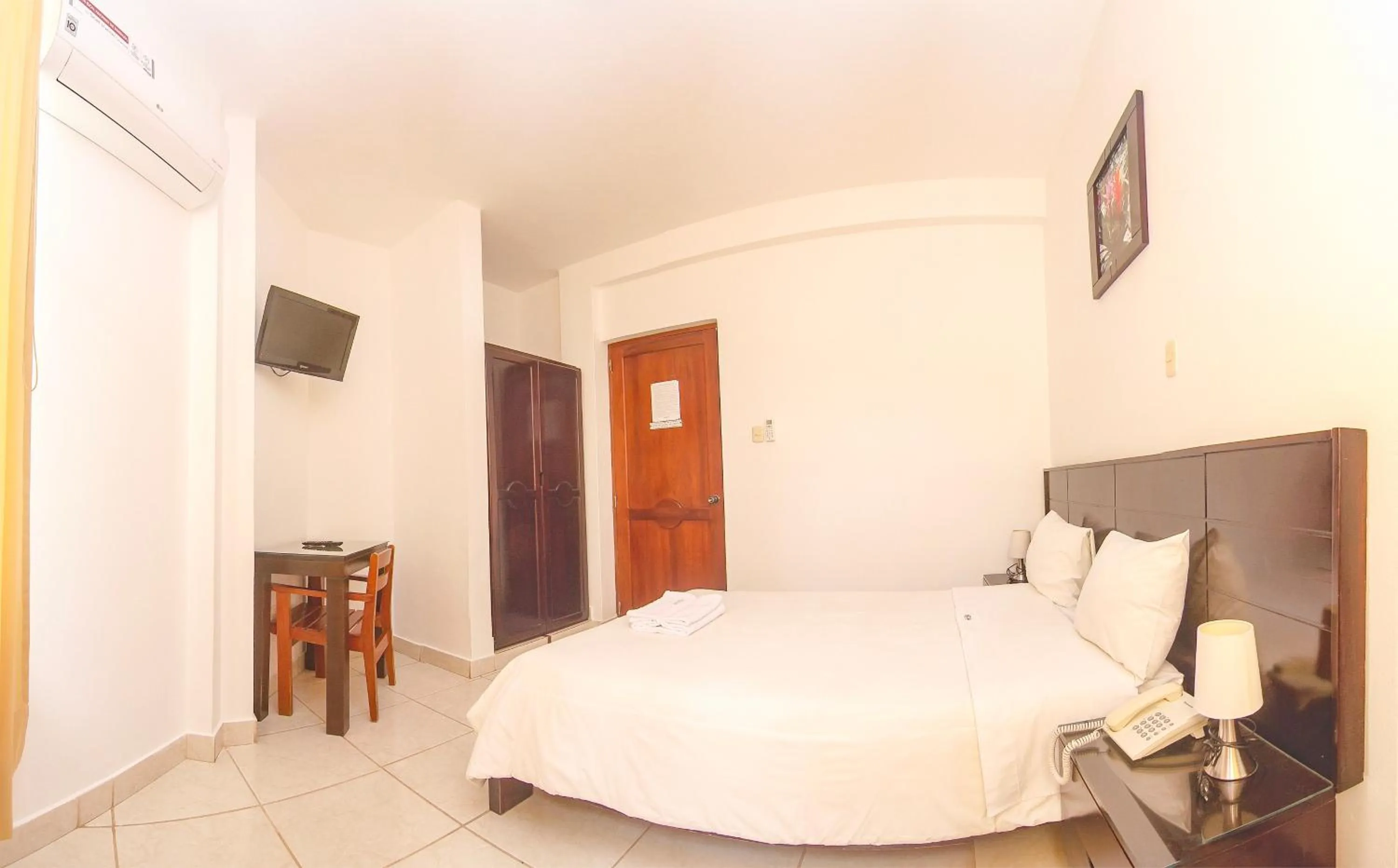 Bed in Hotel Rio Mayo