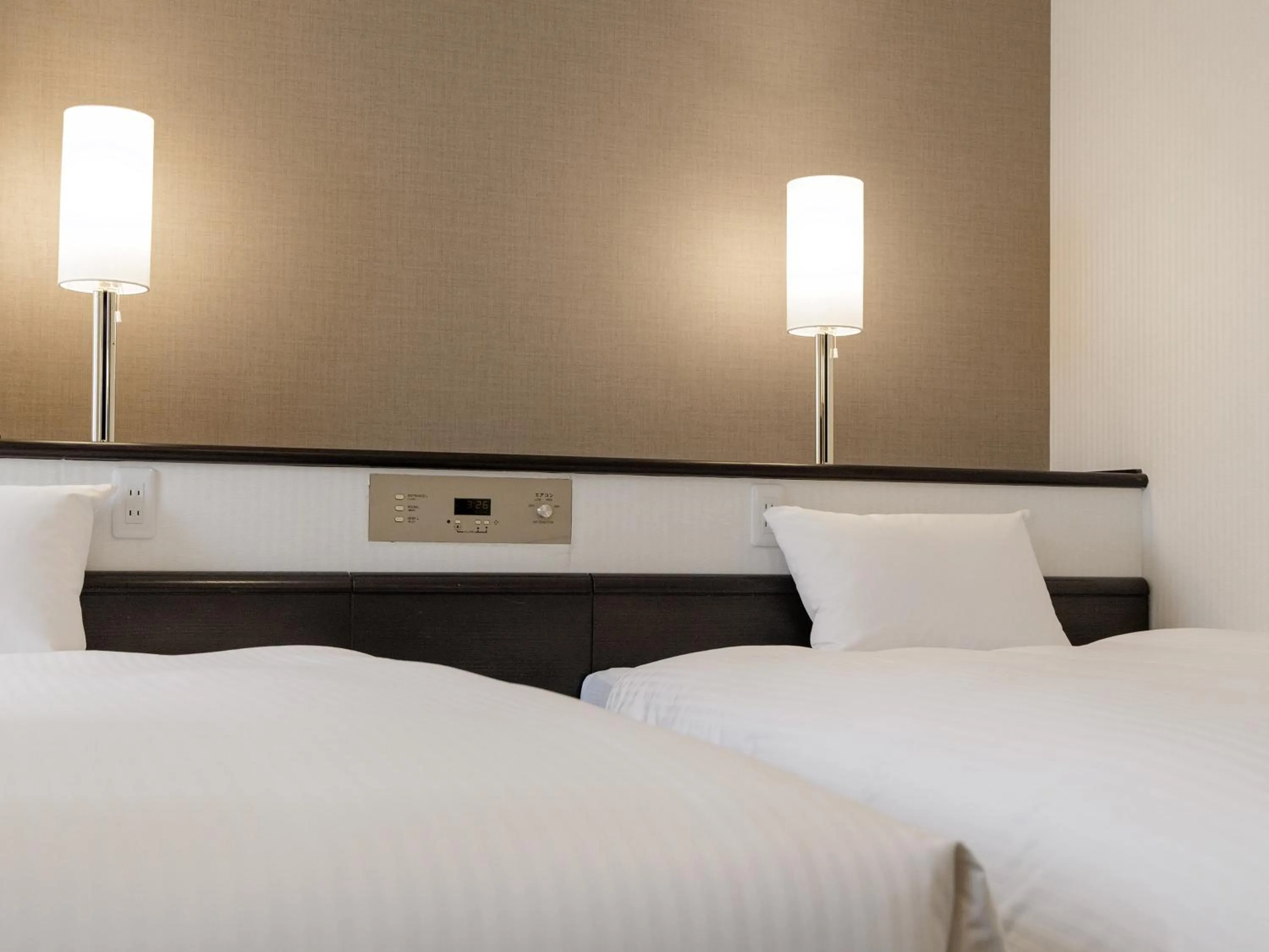 Bedroom, Bed in Nishitetsu Inn Kurosaki