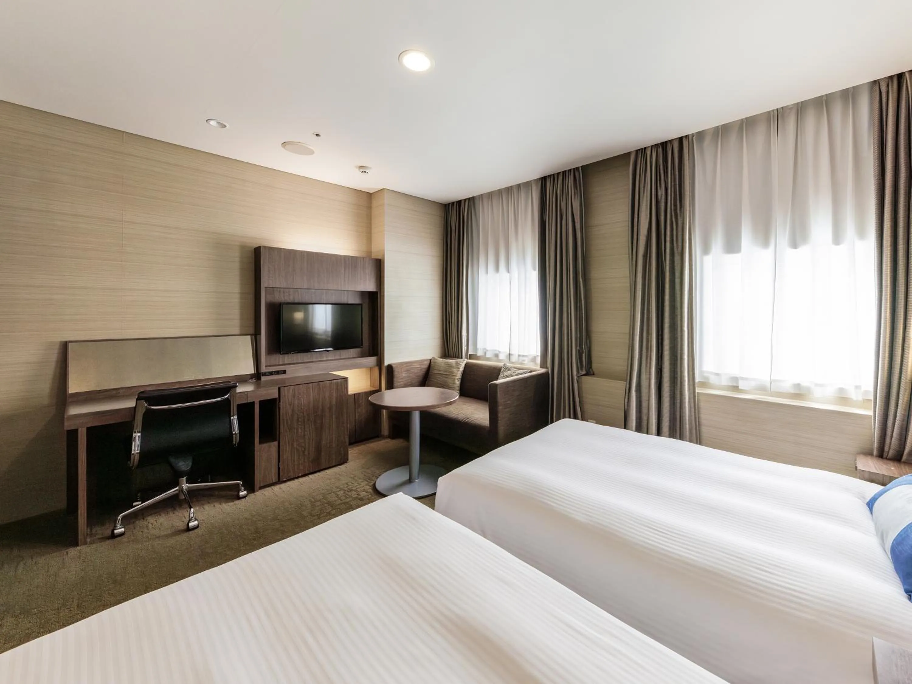 Photo of the whole room, Bed in Nishitetsu Inn Kurosaki