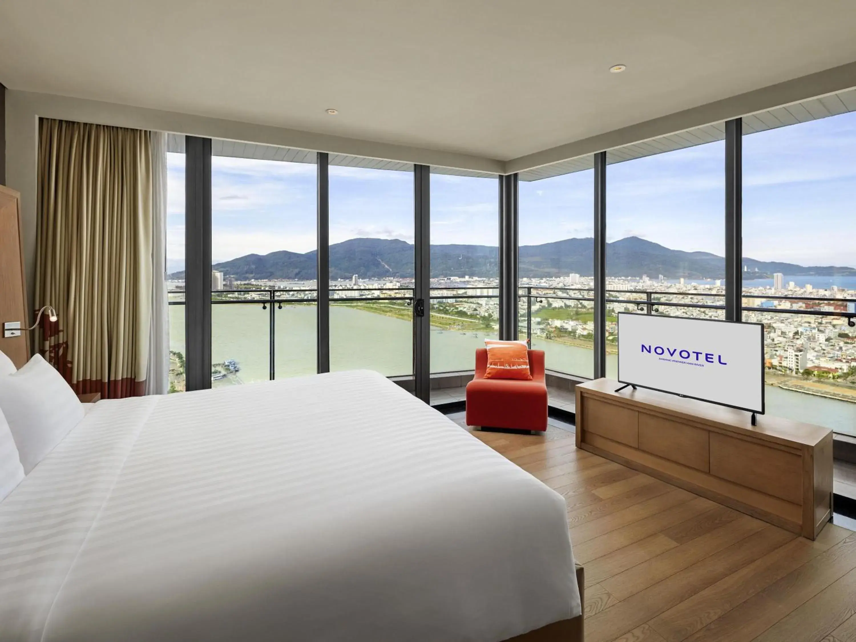 Corner Suite with Balcony and Panoramic River View - Executive Lounge Access in Novotel Danang Premier Han River Corner Suite with Balcony and Panoramic River View - Executive Lounge Access in Novotel Danang Premier Han River