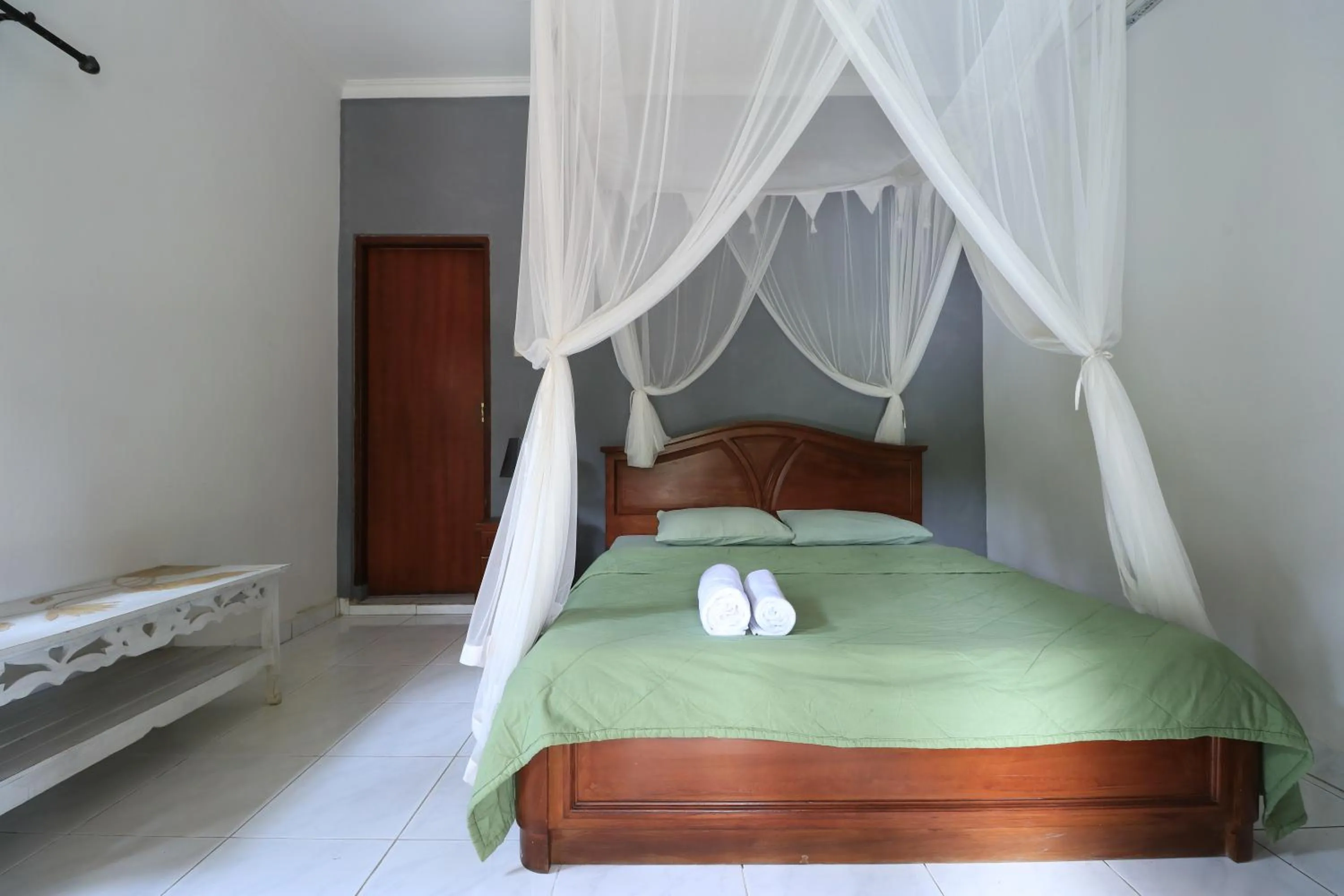 Bed in Yuliati House Ubud