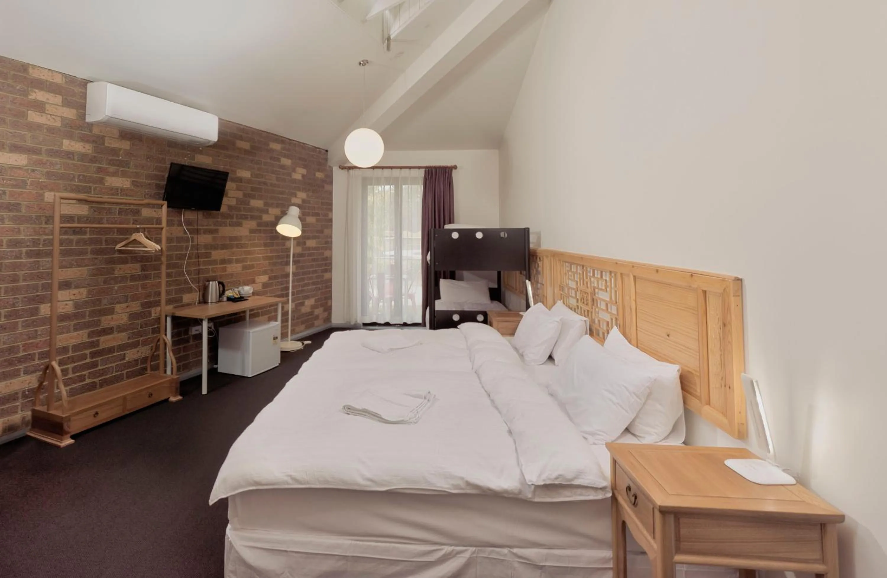 Bed in Sinofield Edu-Retreat